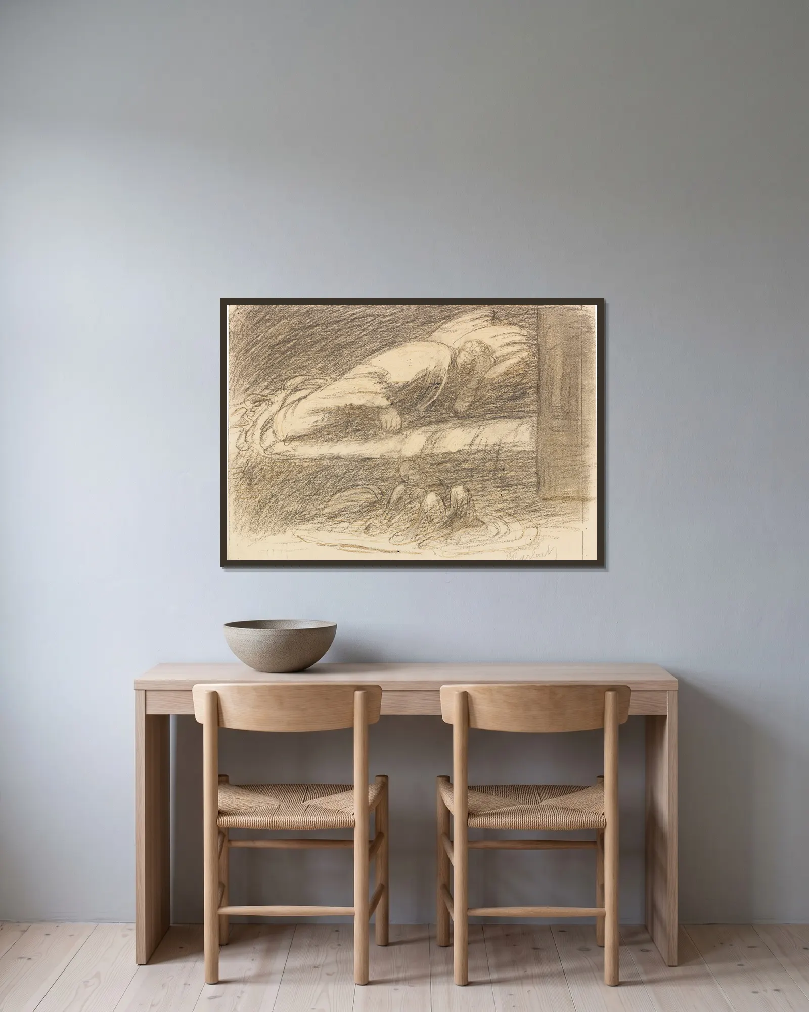 Träumender Jüngling av Ernst Barlach inramad på en vägg
