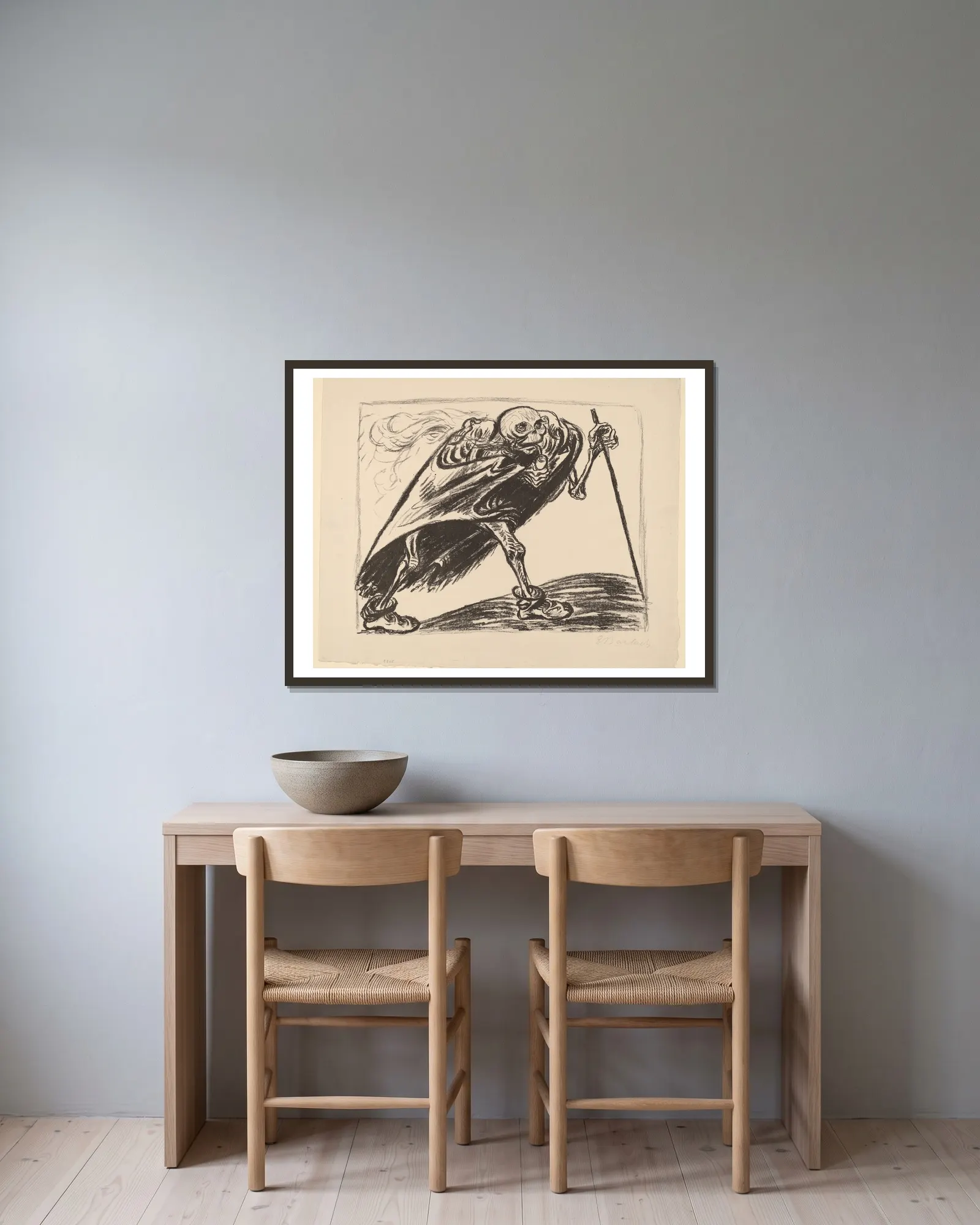 Wandering Death av Ernst Barlach inramad på en vägg