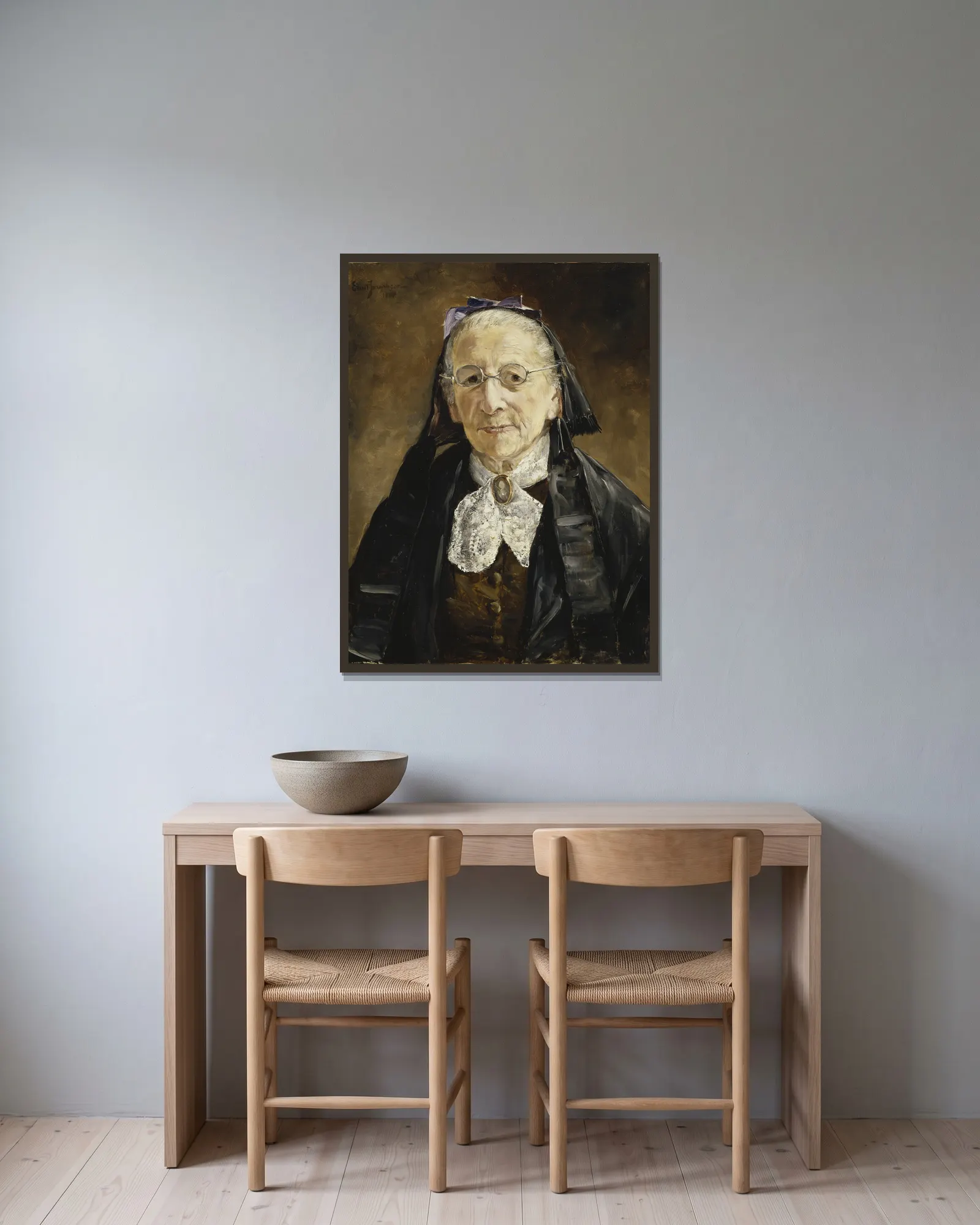 Fru Hanna Marcus av Ernst Josephson inramad på en vägg