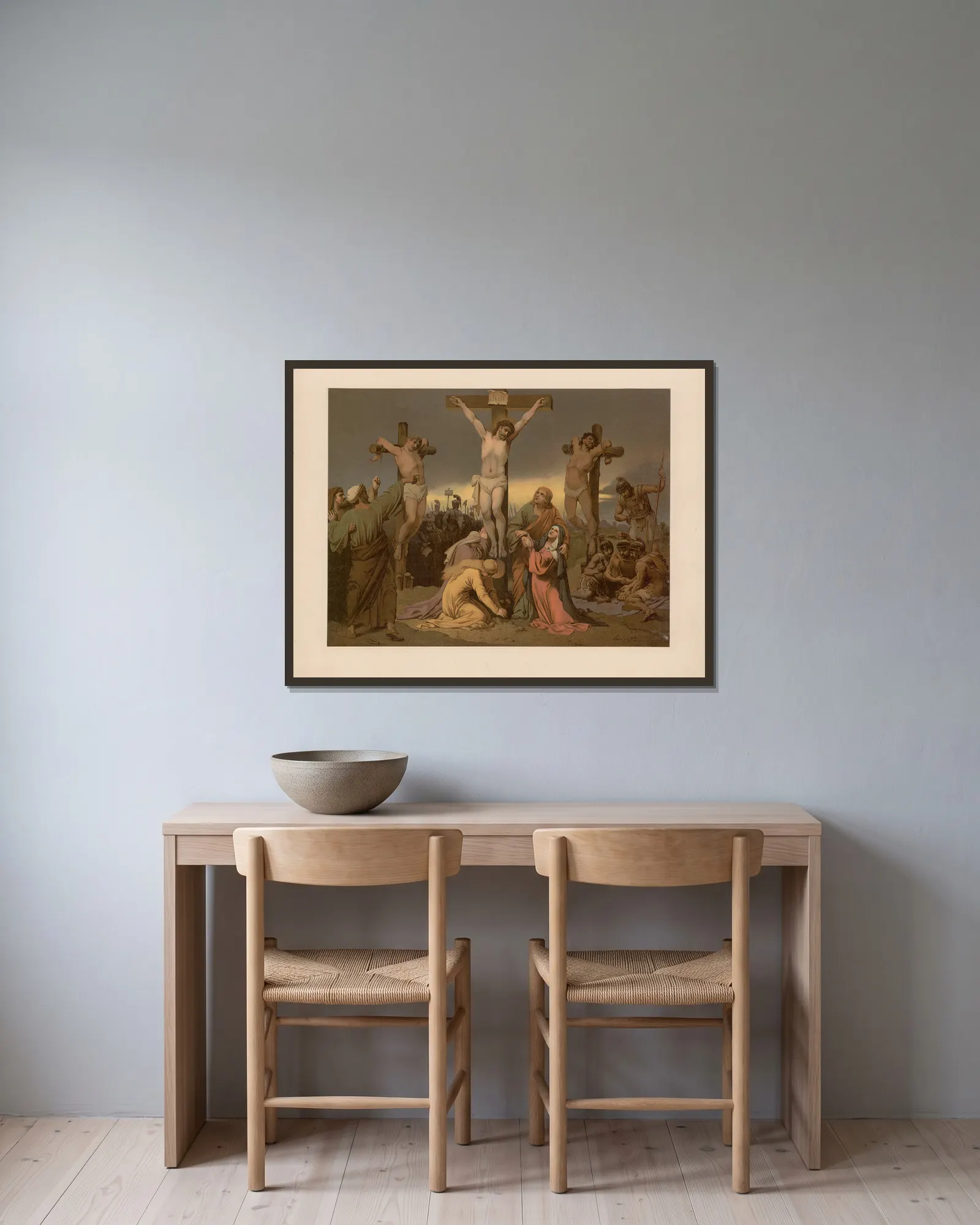 The Crucifixion av Ernst Pessler inramad på en vägg
