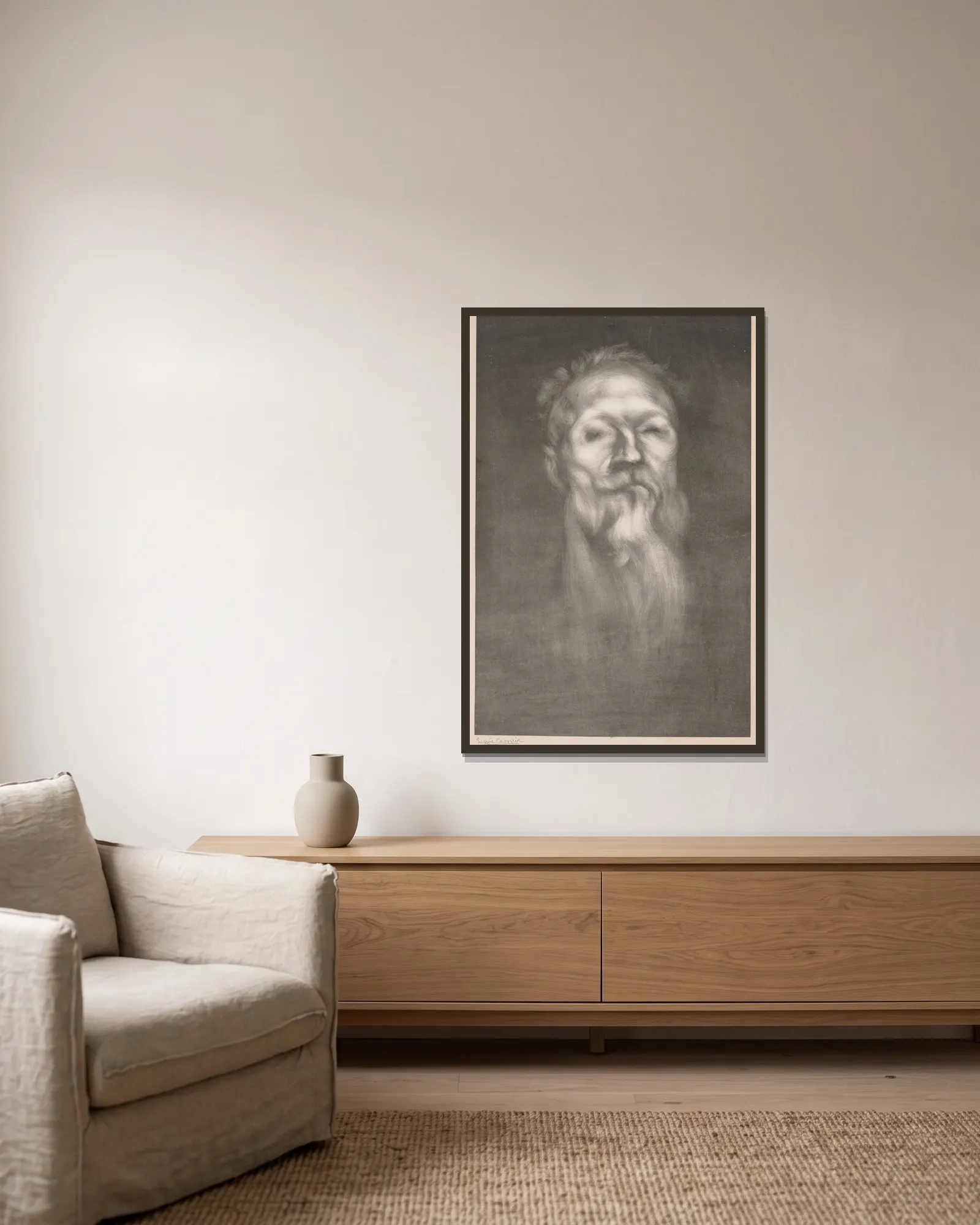 Auguste Rodin av Eugène Carriere inramad på en vägg