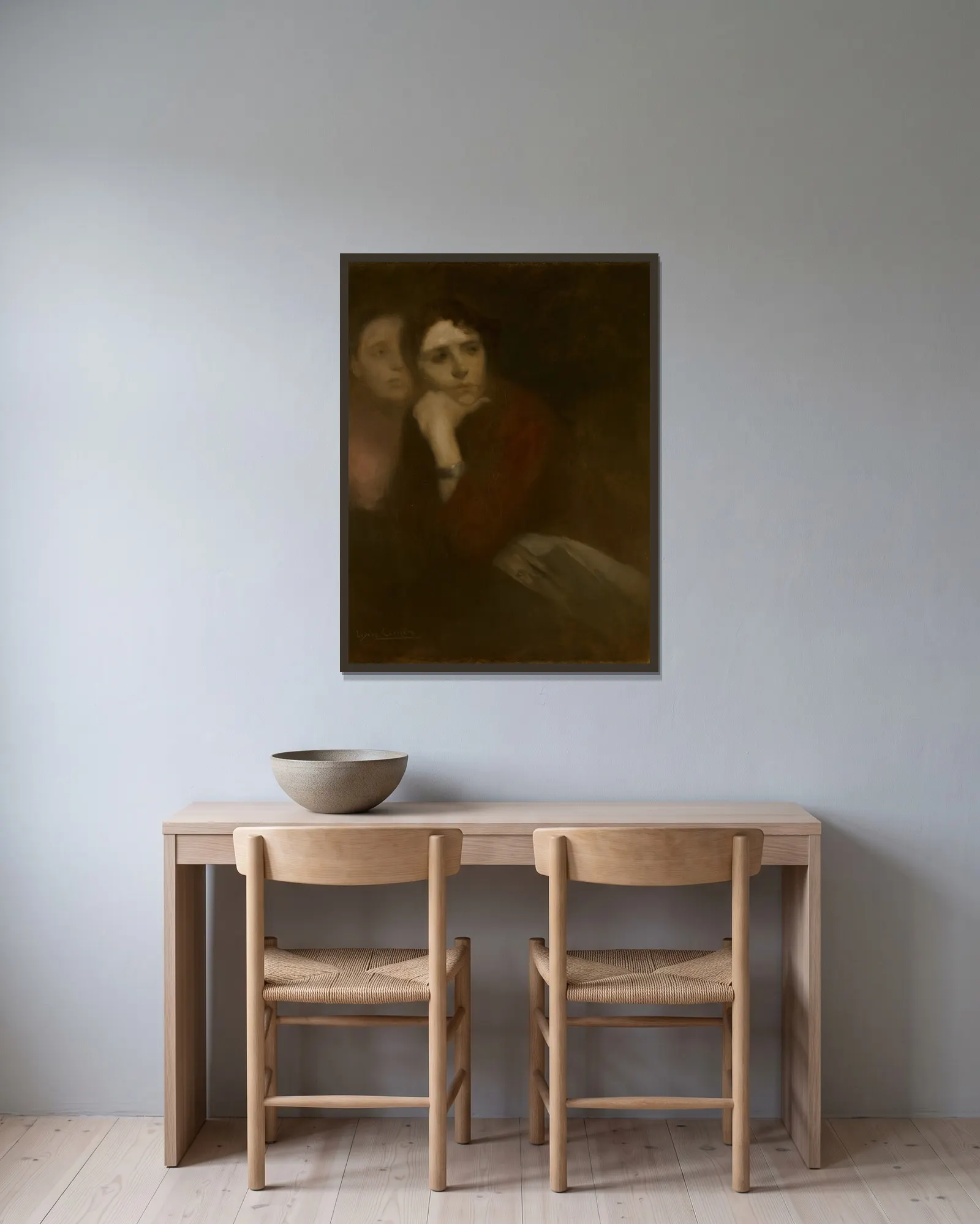 Two Women av Eugène Carriere inramad på en vägg