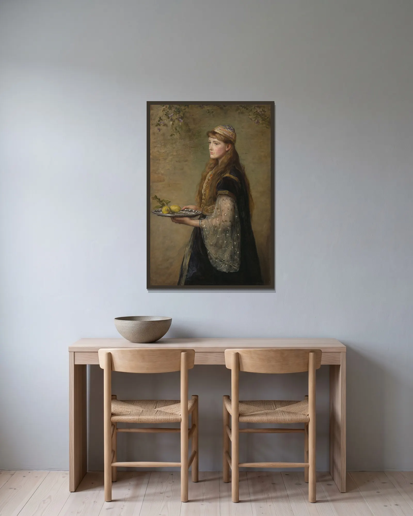 The captive av Sir John Everett Millais inramad på en vägg