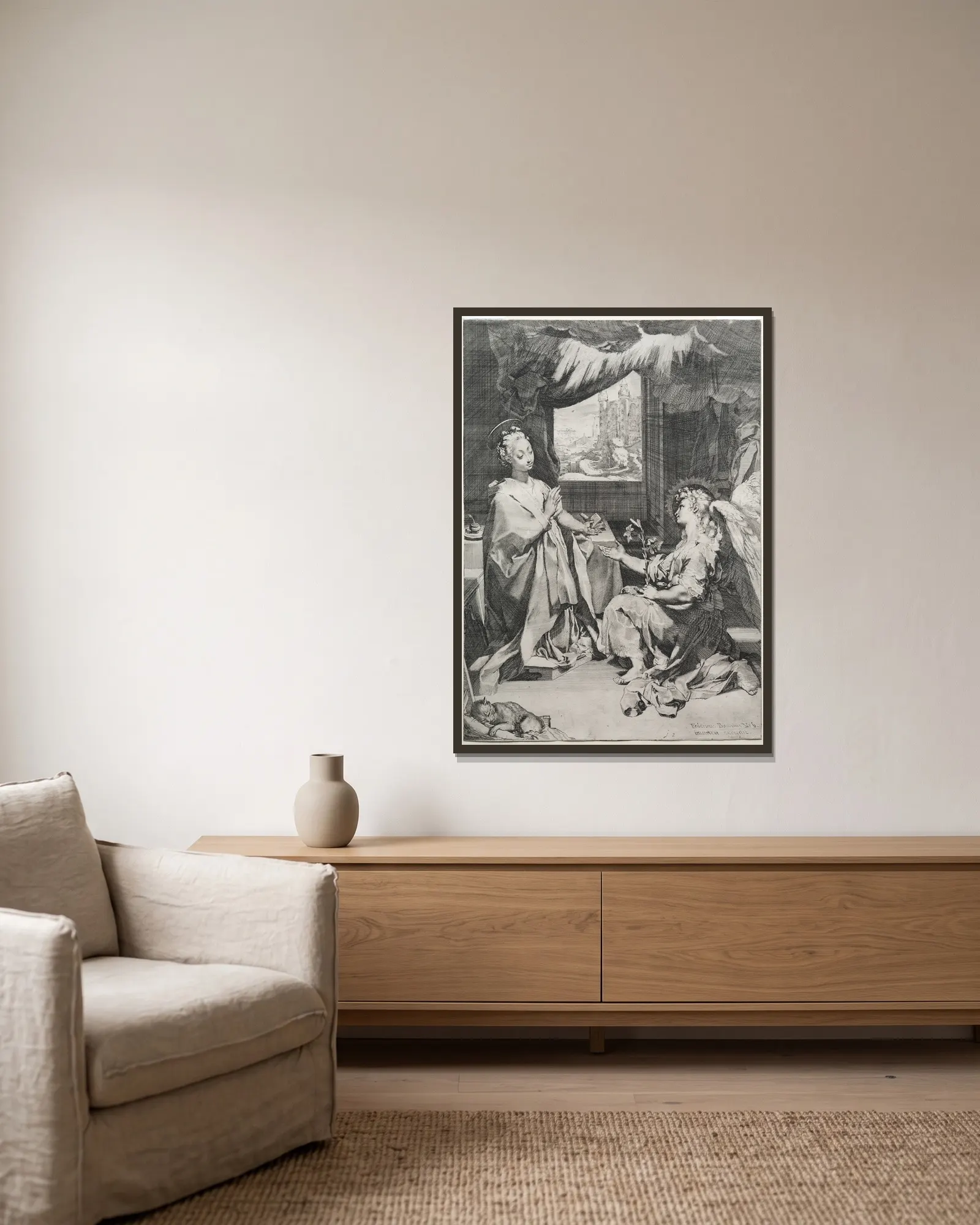 The Annunciation av Federico Barocci inramad på en vägg