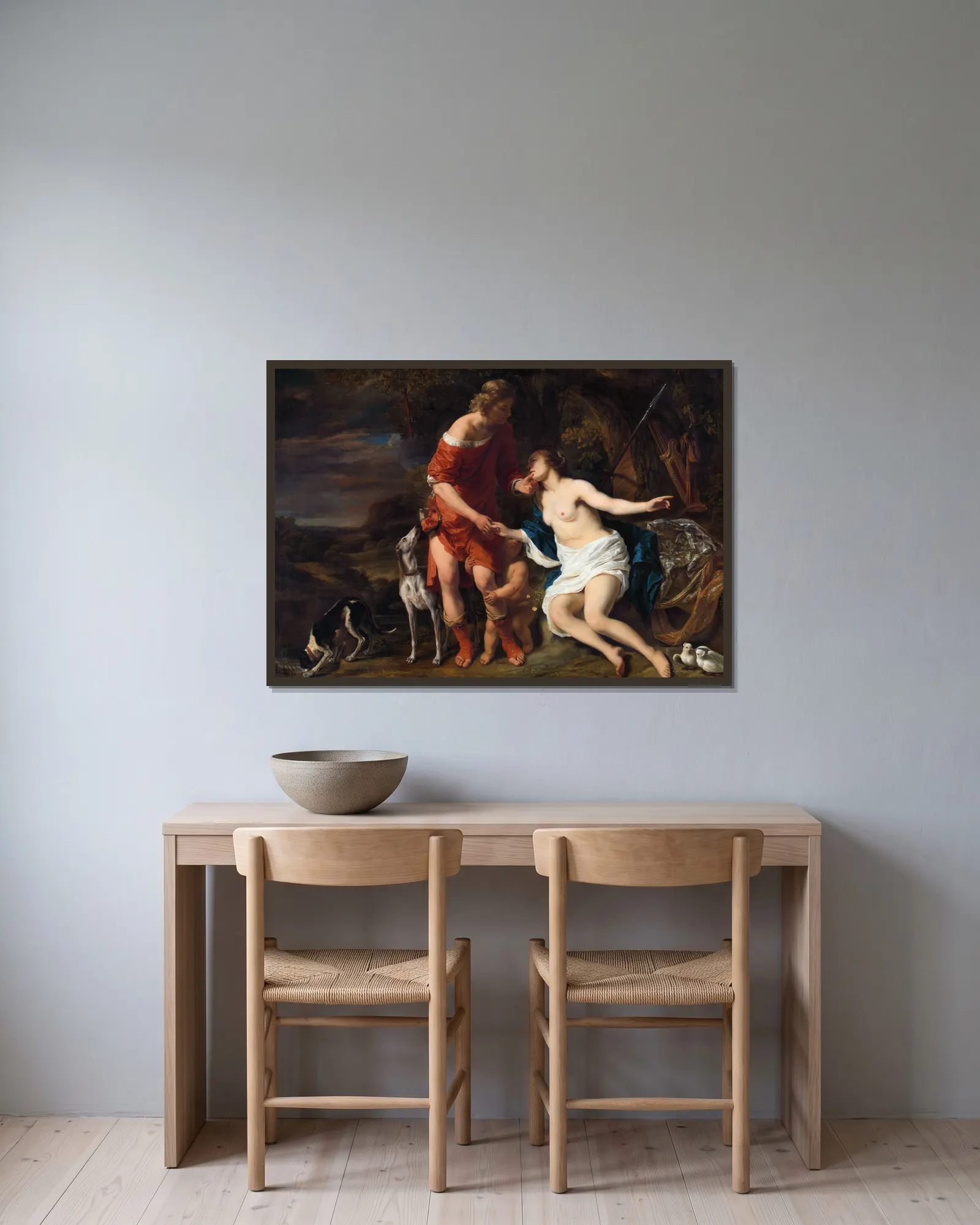 Venus and Adonis av Ferdinand Bol inramad på en vägg