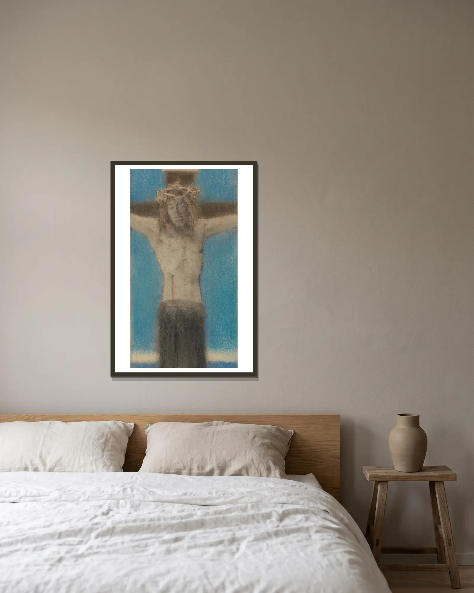 Caritas Aeterna av Fernand Khnopff inramad på en vägg