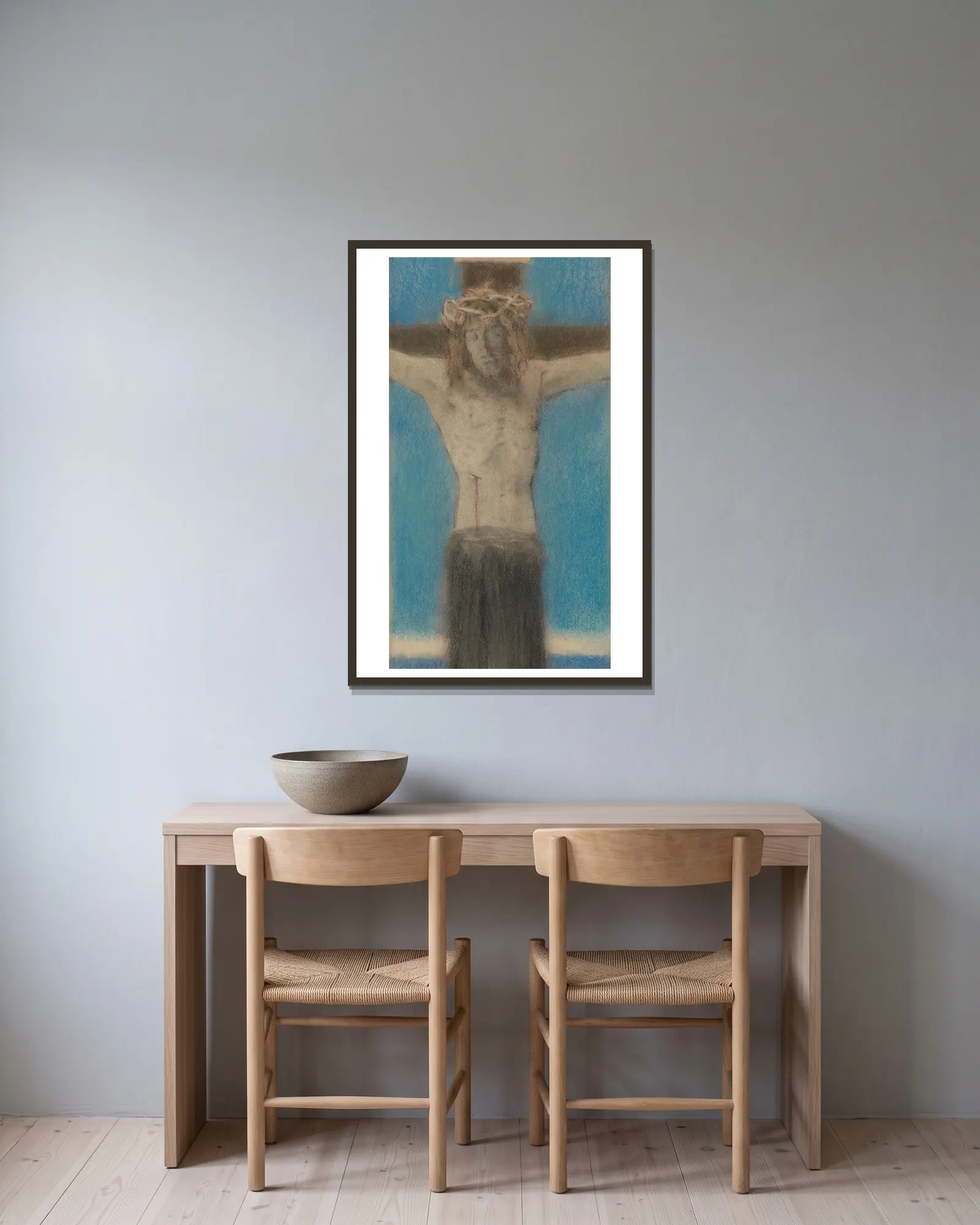 Caritas Aeterna av Fernand Khnopff inramad på en vägg