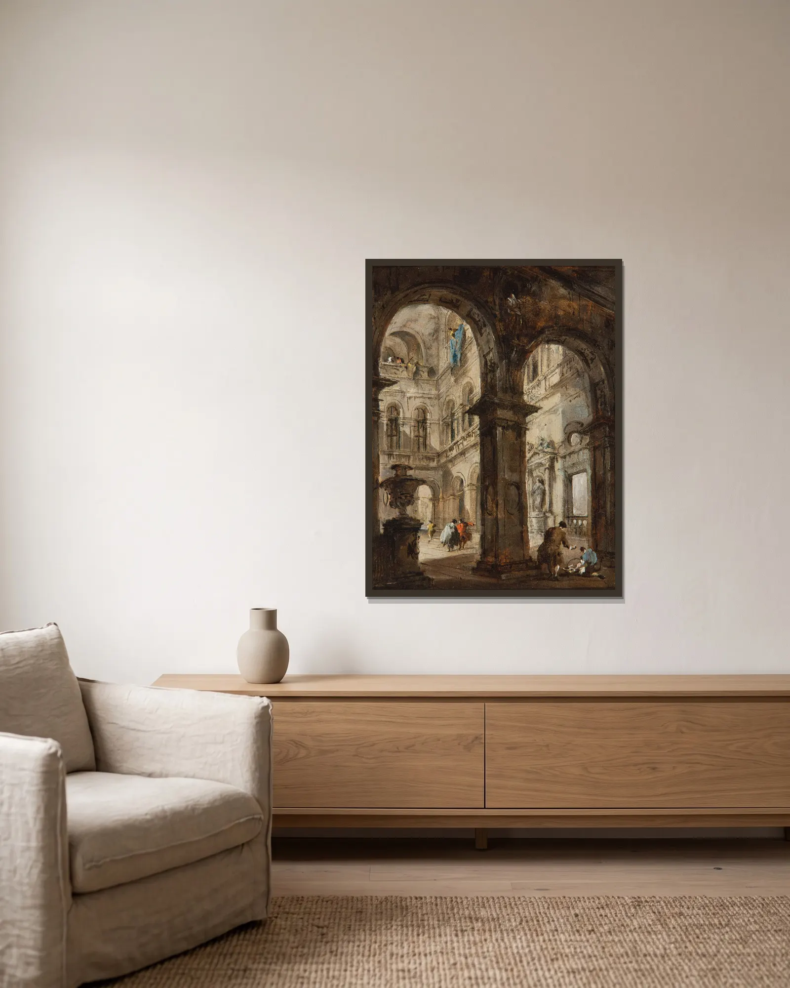 An architectural capriccio av Francesco Guardi inramad på en vägg