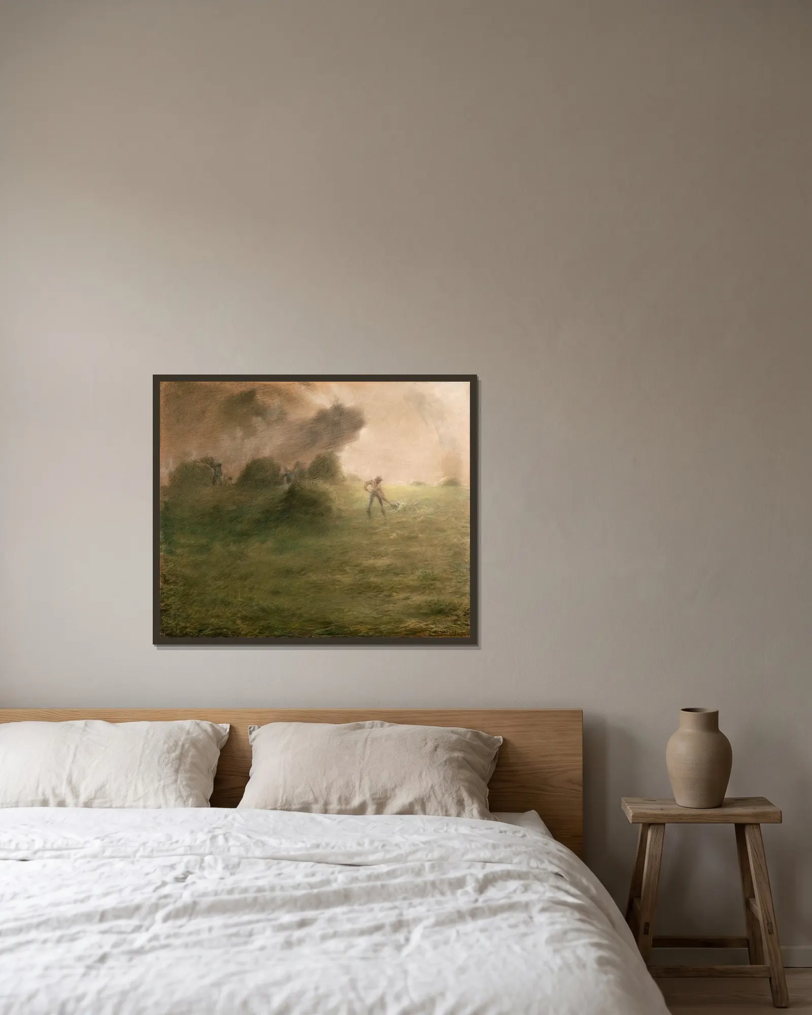 A Storm during Haymaking av Jean-François Millet inramad på en vägg
