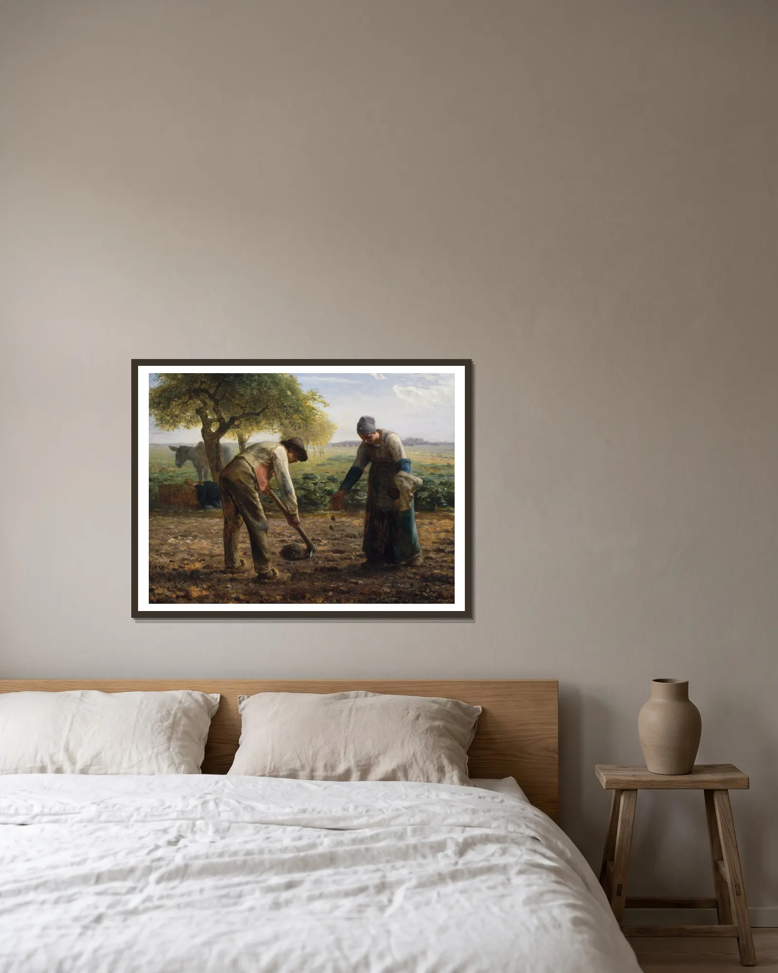 Potato Planters av Jean-François Millet inramad på en vägg