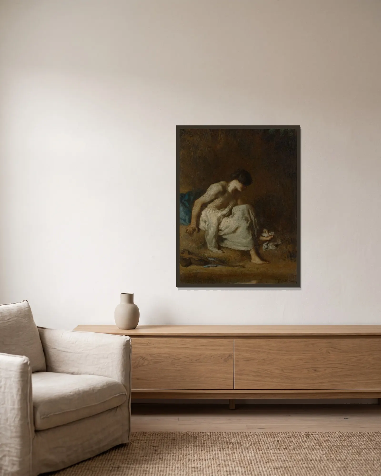 The Bather av Jean-François Millet inramad på en vägg