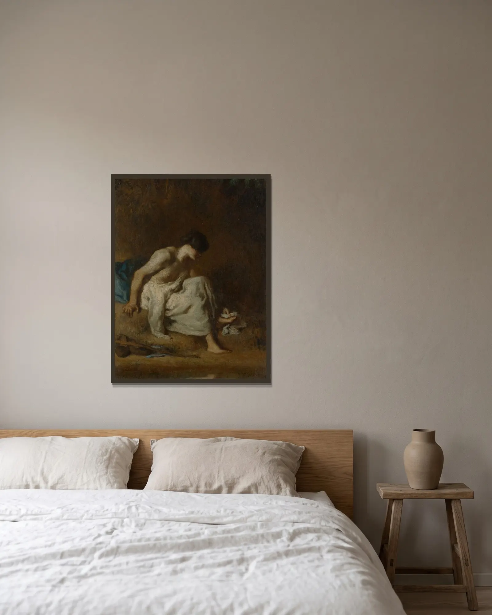 The Bather av Jean-François Millet inramad på en vägg