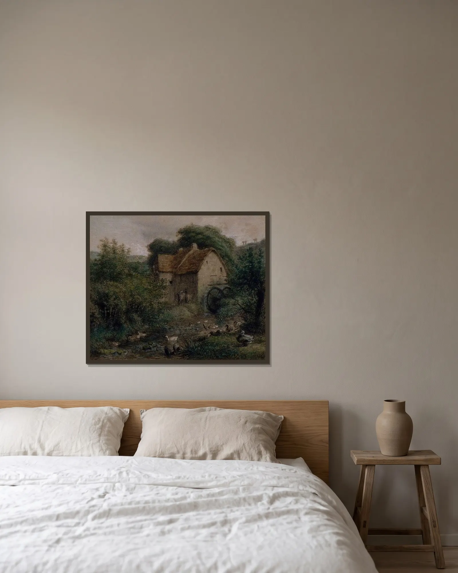 The Old Mill av Jean-François Millet inramad på en vägg