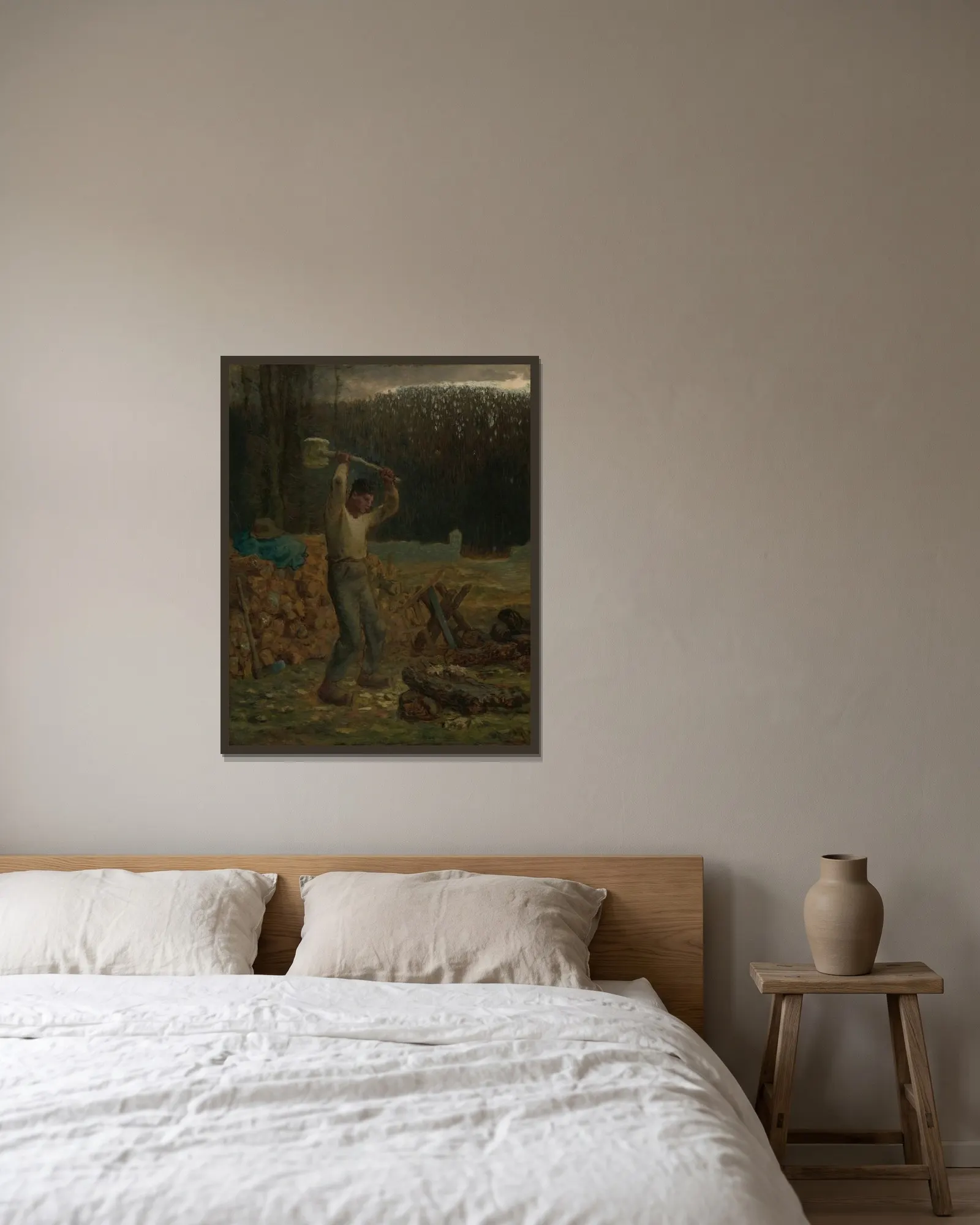 The Woodchopper av Jean-François Millet inramad på en vägg