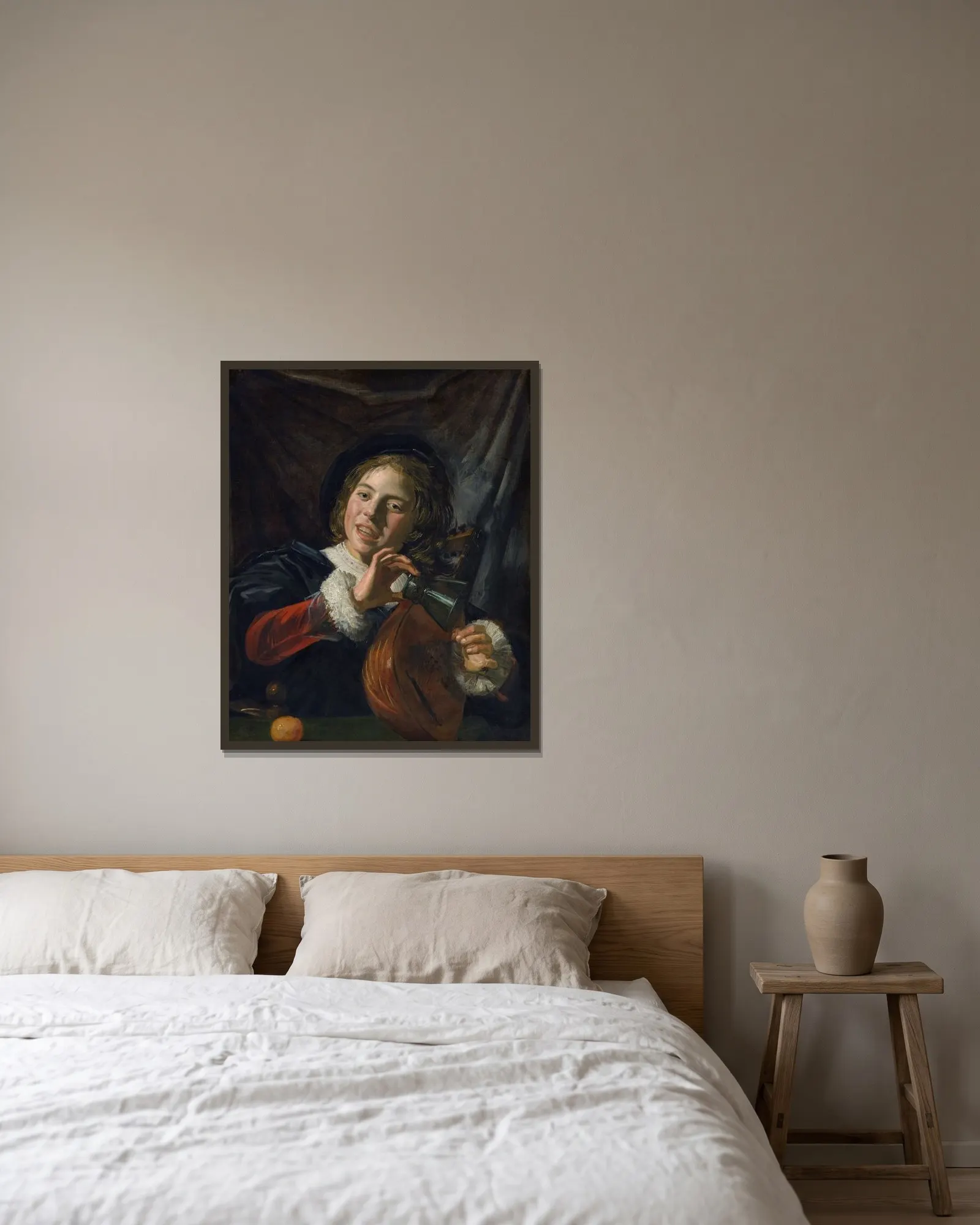 Boy with a Lute av Frans Hals inramad på en vägg