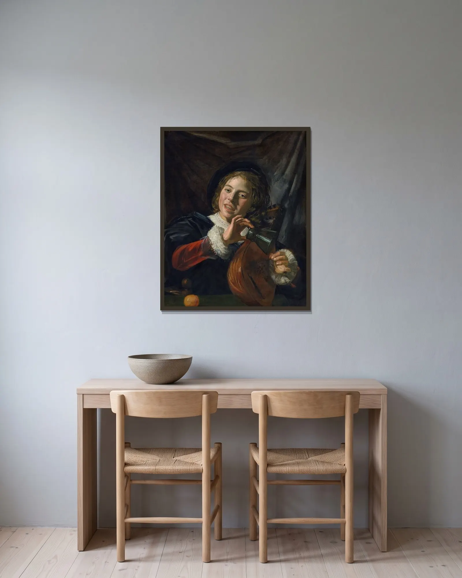Boy with a Lute av Frans Hals inramad på en vägg