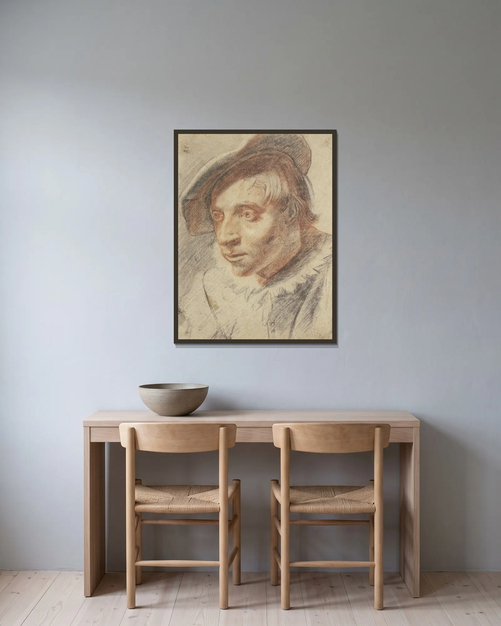 Brustbild eines Bauern mit Kappe av Frans Hals inramad på en vägg