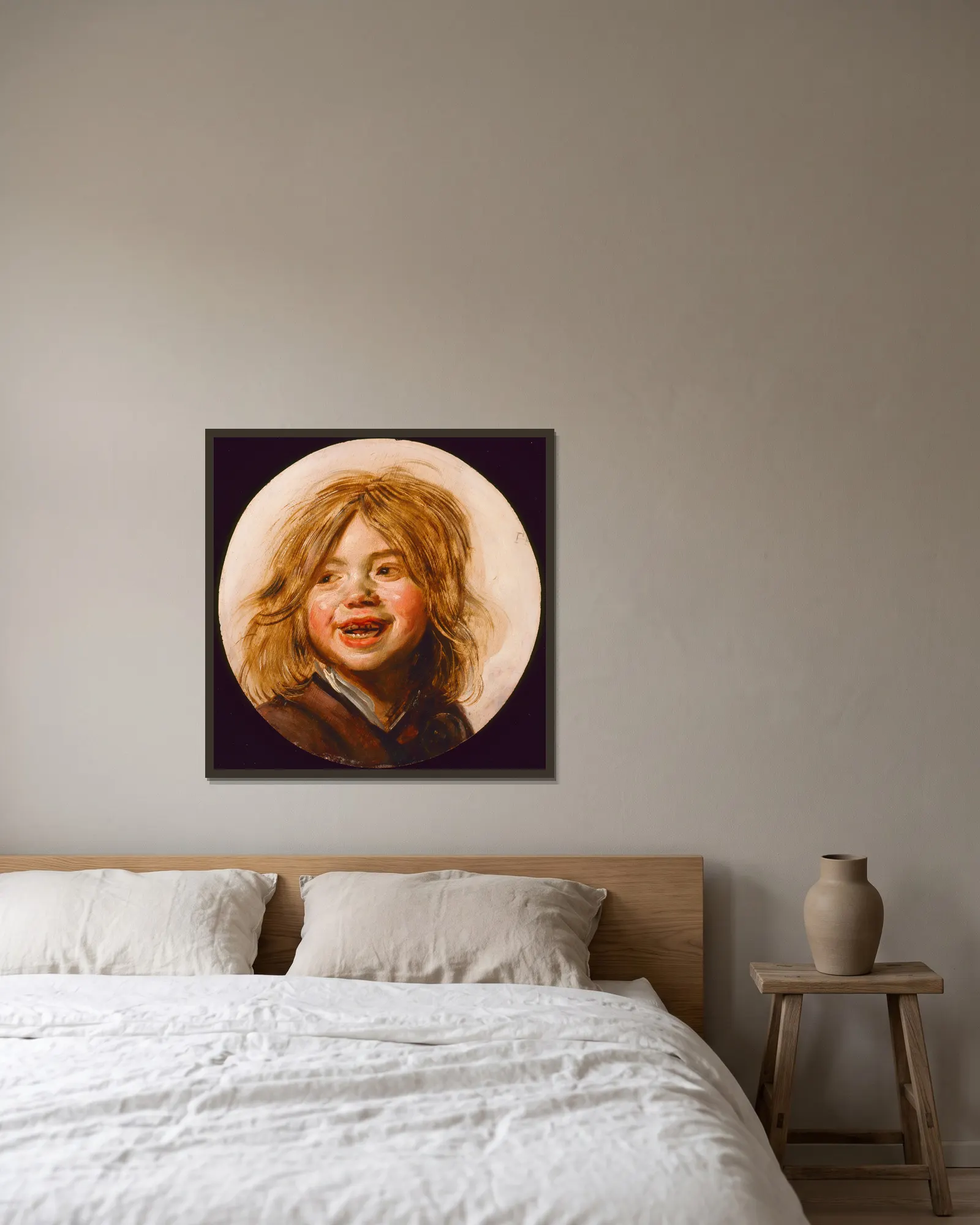 Laughing Child av Frans Hals inramad på en vägg