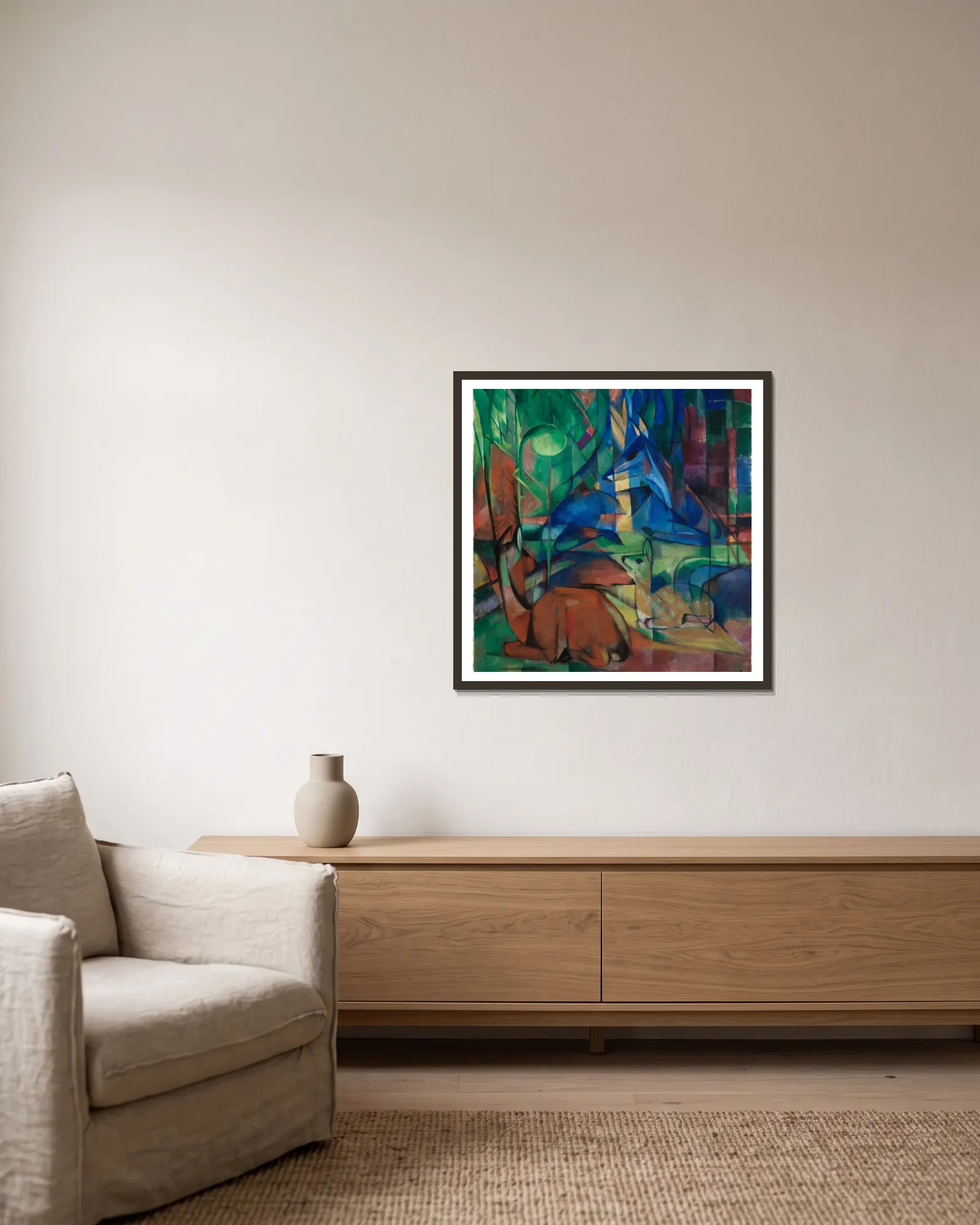 Rehe im Walde II av Franz Marc inramad på en vägg
