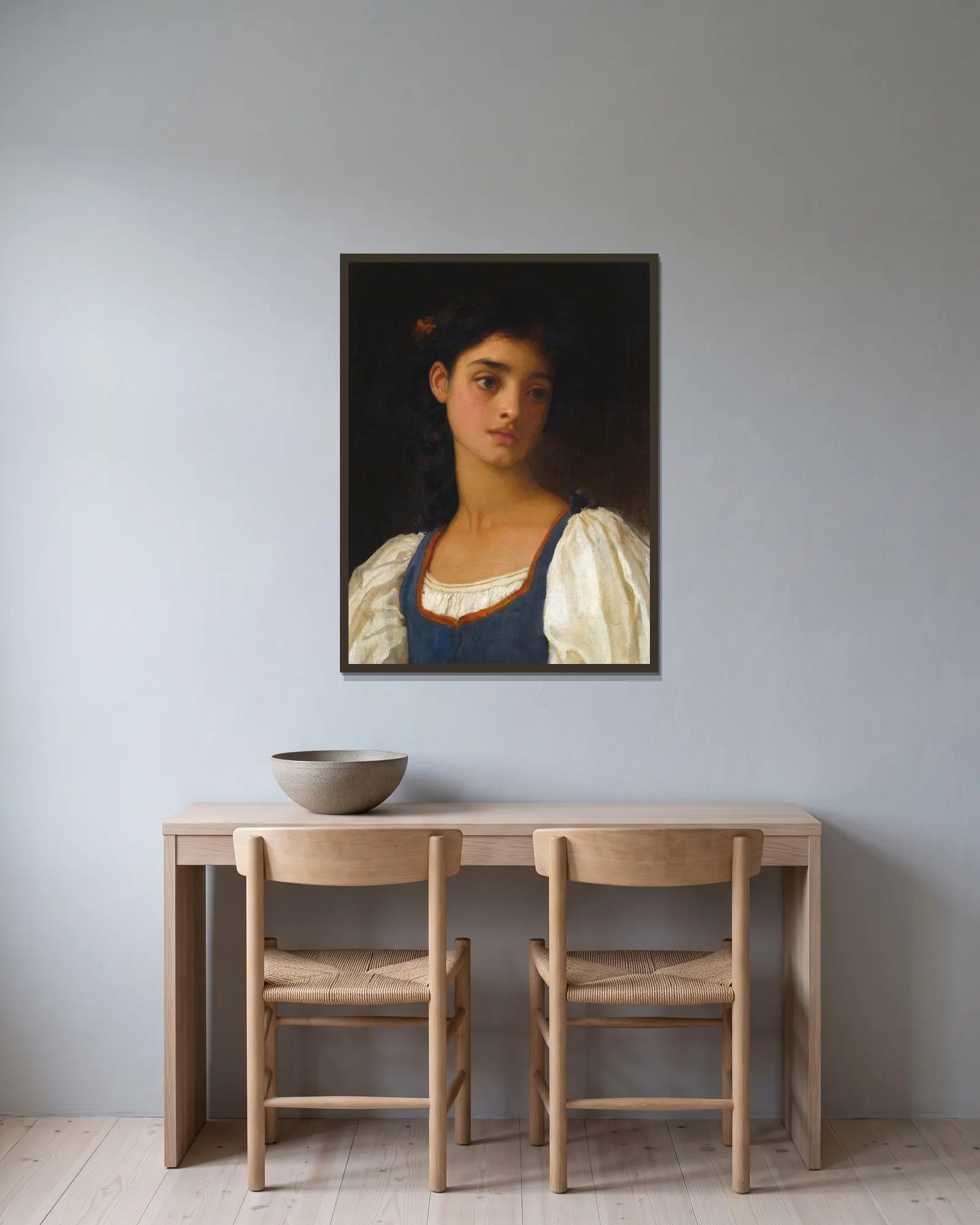 Nicandra av Frederic Leighton inramad på en vägg