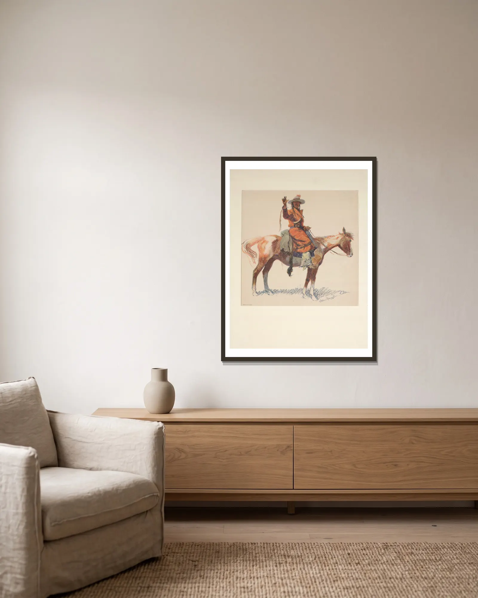 An Apache scout av Frederic Remington inramad på en vägg