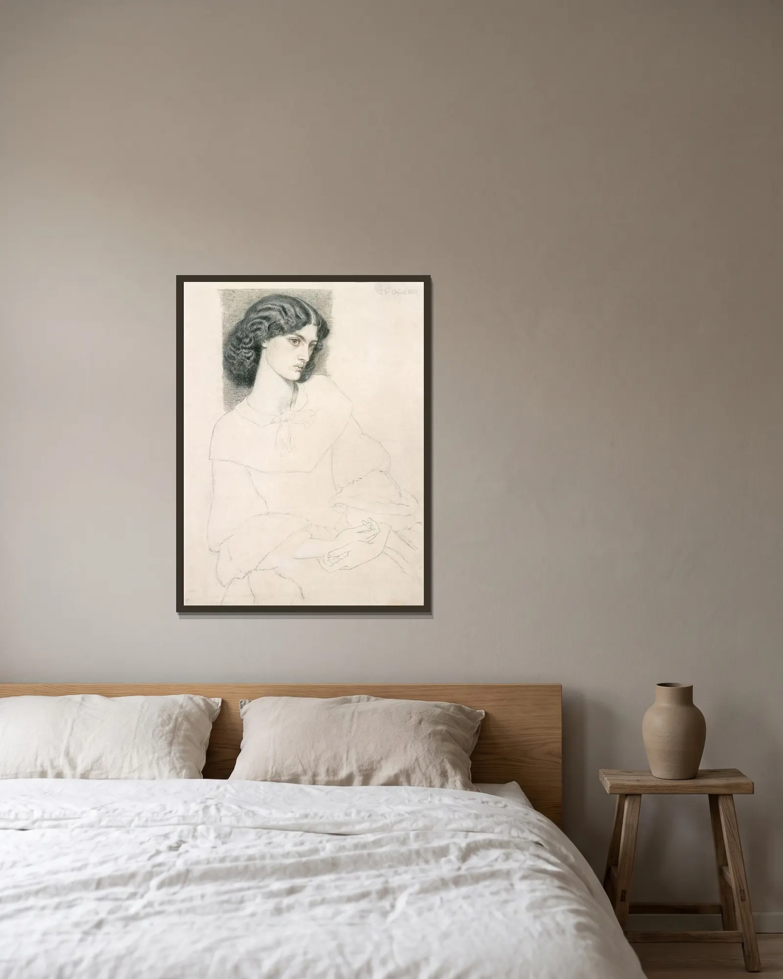Jane Burden (1840-1914) av Dante Gabriel Rossetti inramad på en vägg