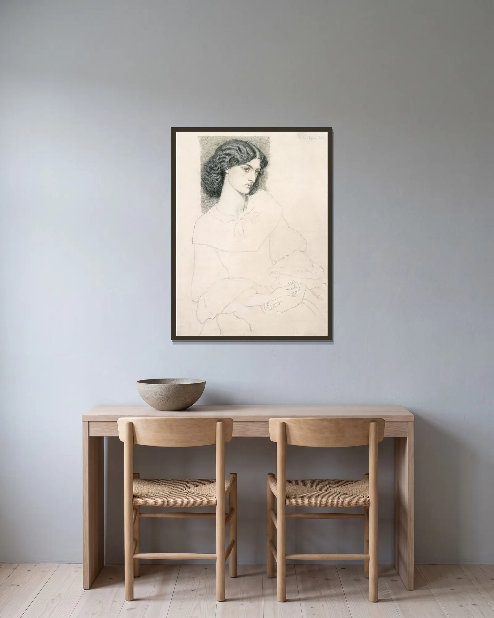 Jane Burden (1840-1914) av Dante Gabriel Rossetti inramad på en vägg
