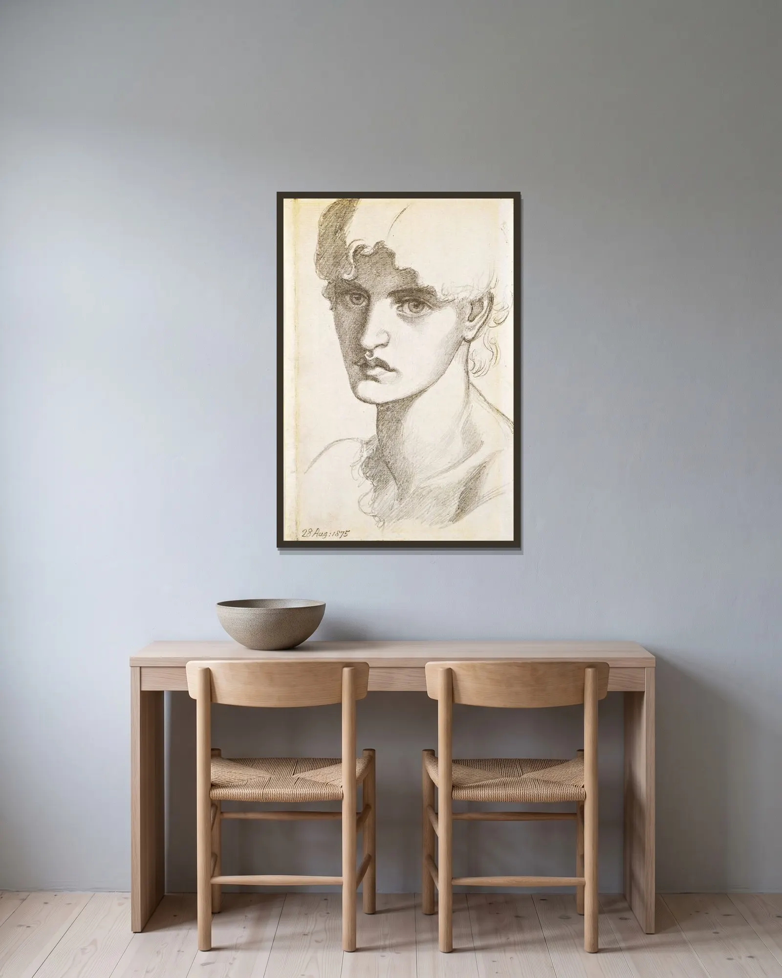 Jane Morris av Dante Gabriel Rossetti inramad på en vägg