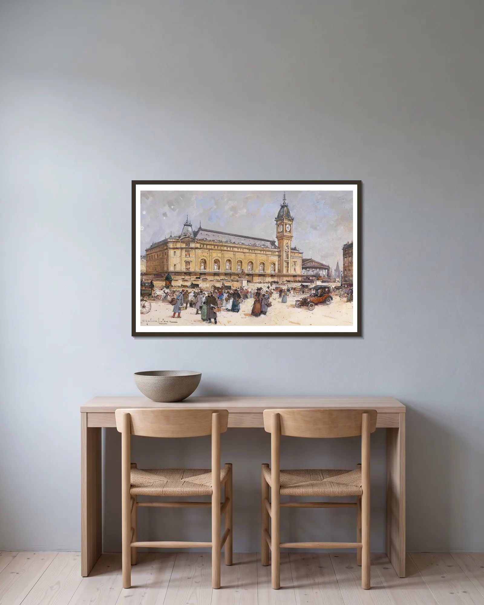 Gare de Lyon av Eugène Galien-Laloue inramad på en vägg