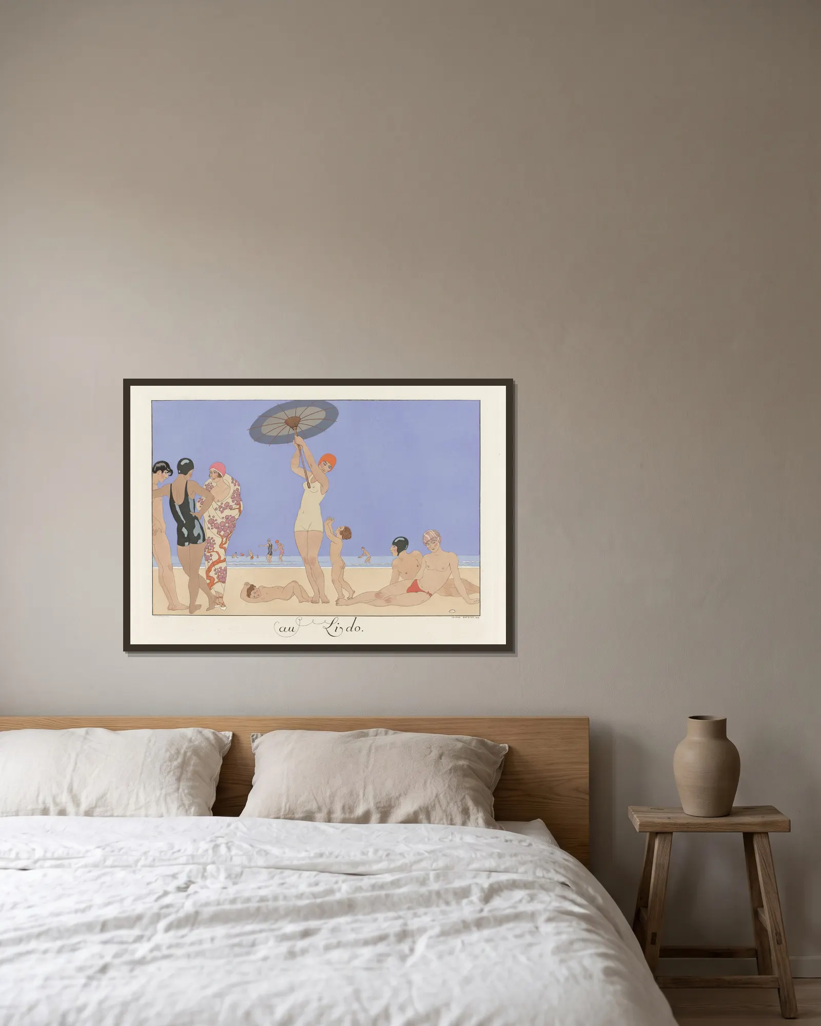 Au Lido av George Barbier inramad på en vägg
