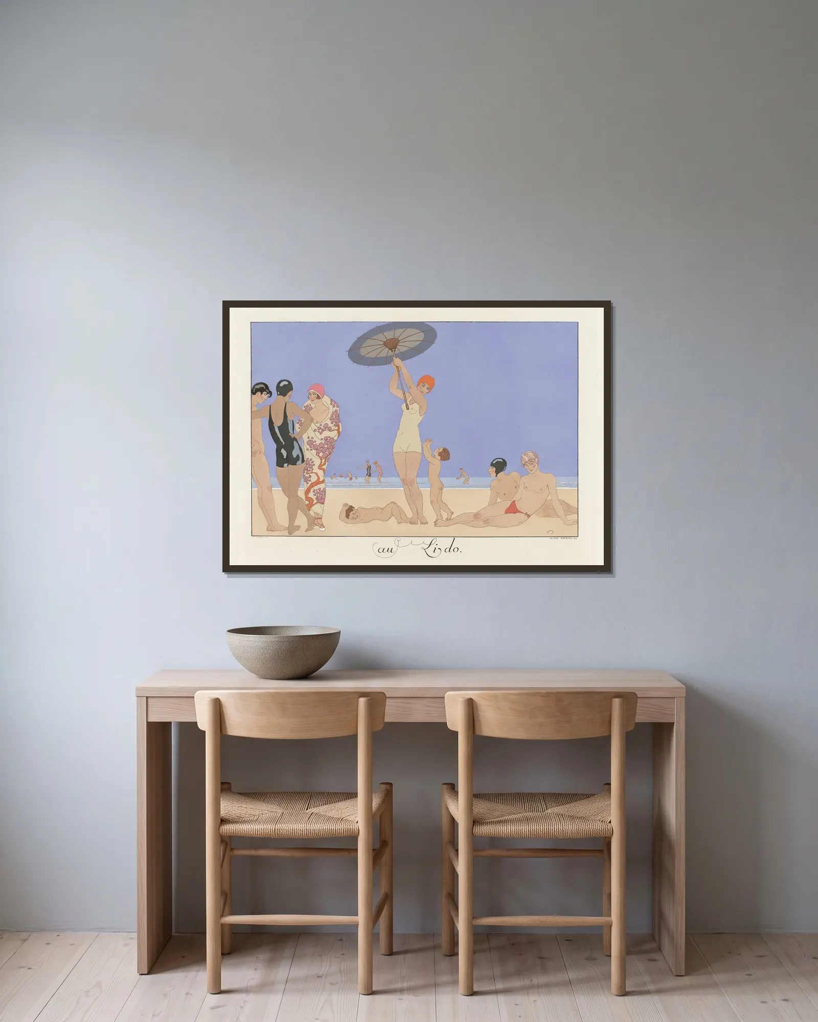 Au Lido av George Barbier inramad på en vägg