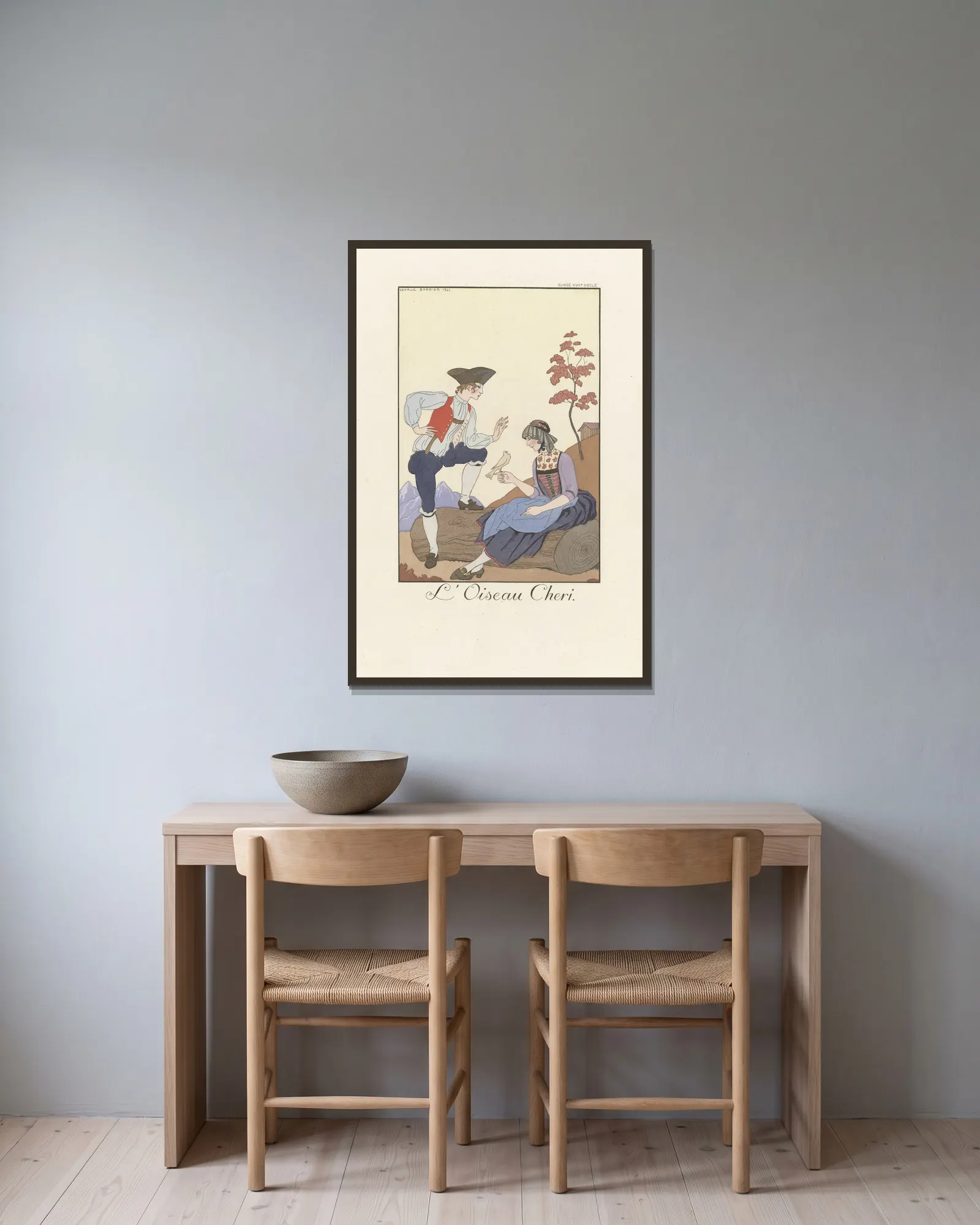 L’Oiseau Cheri av George Barbier inramad på en vägg