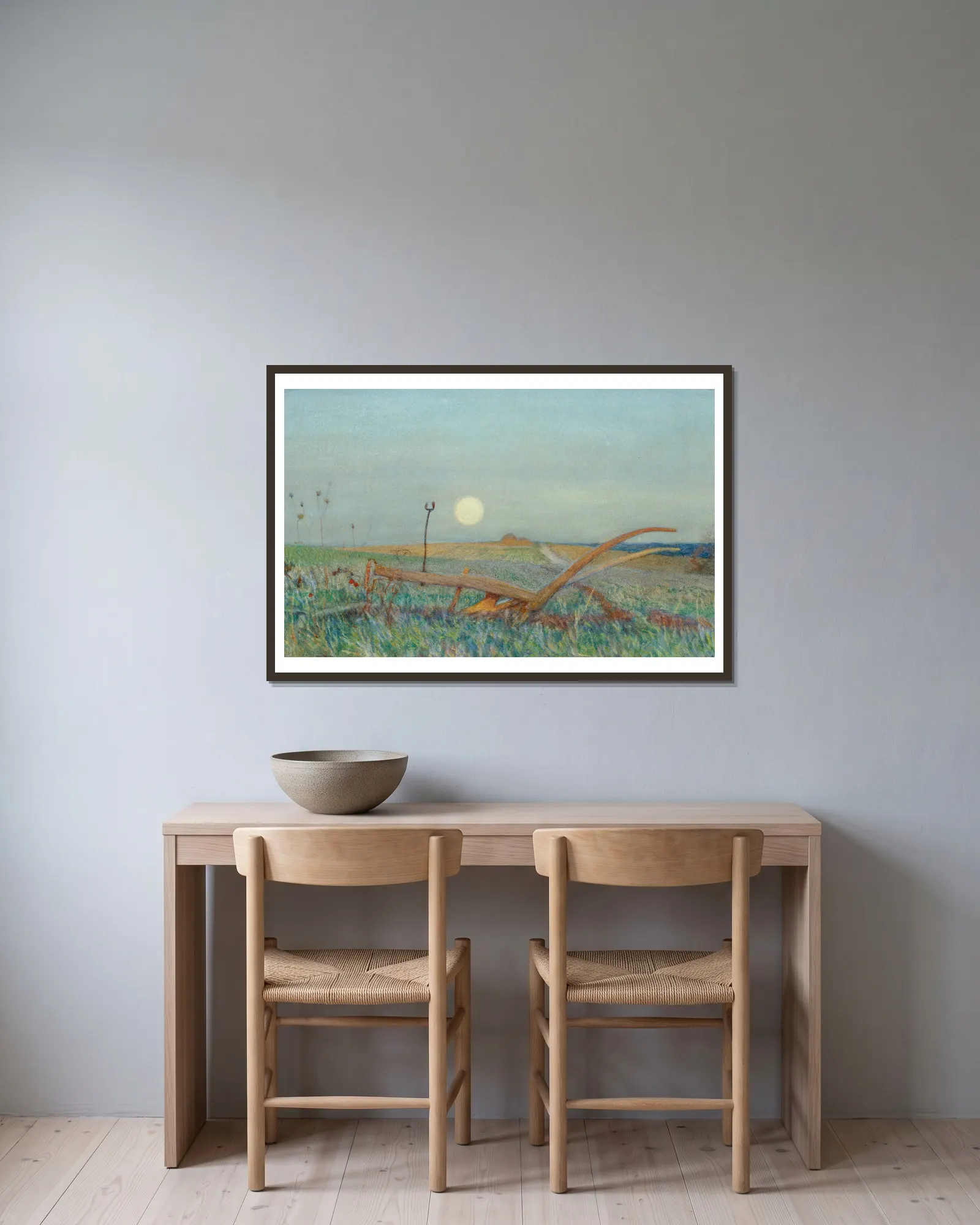 The Plough av Sir George Clausen inramad på en vägg