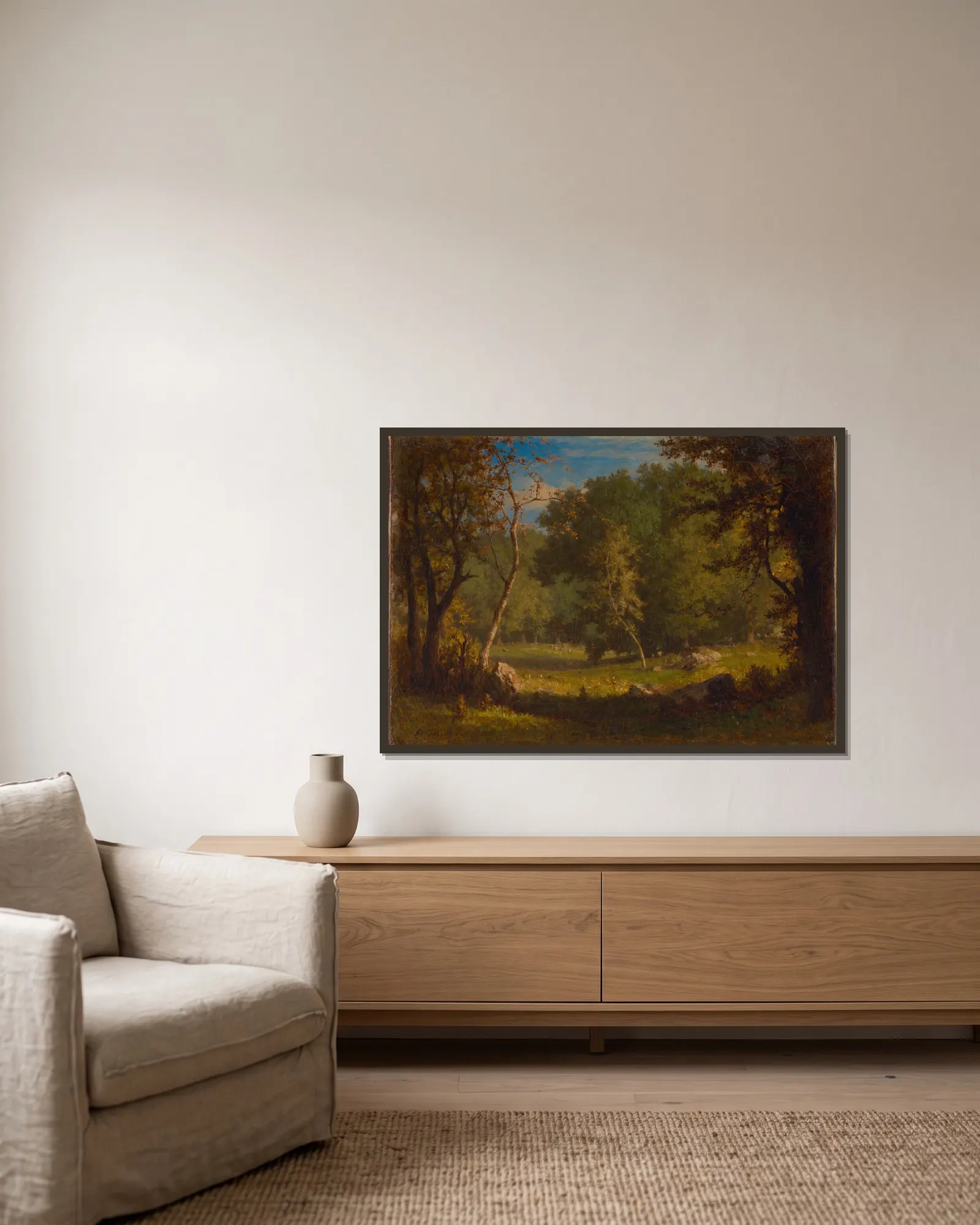 Elf Ground av George Inness inramad på en vägg
