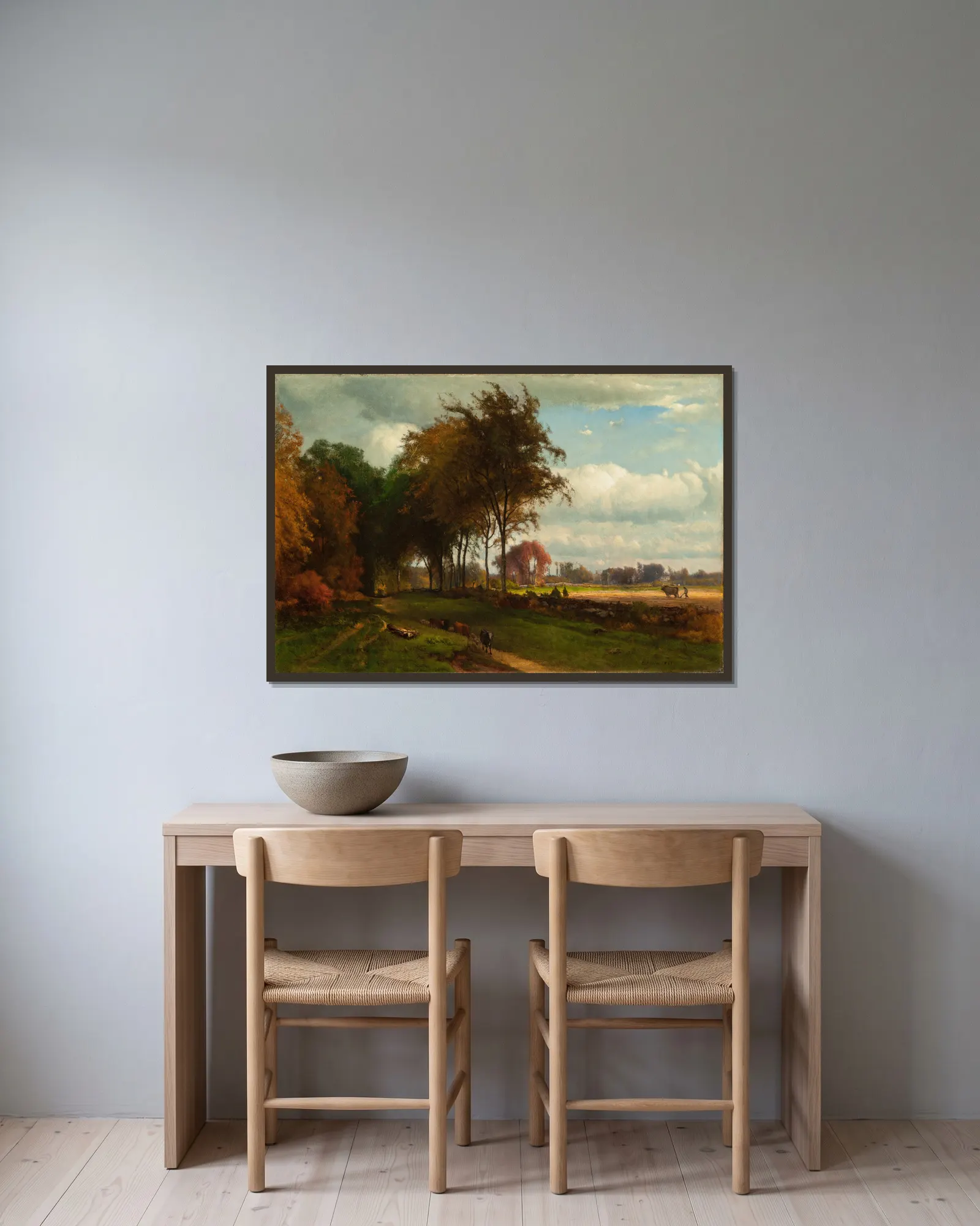 Landscape with Cattle av George Inness inramad på en vägg