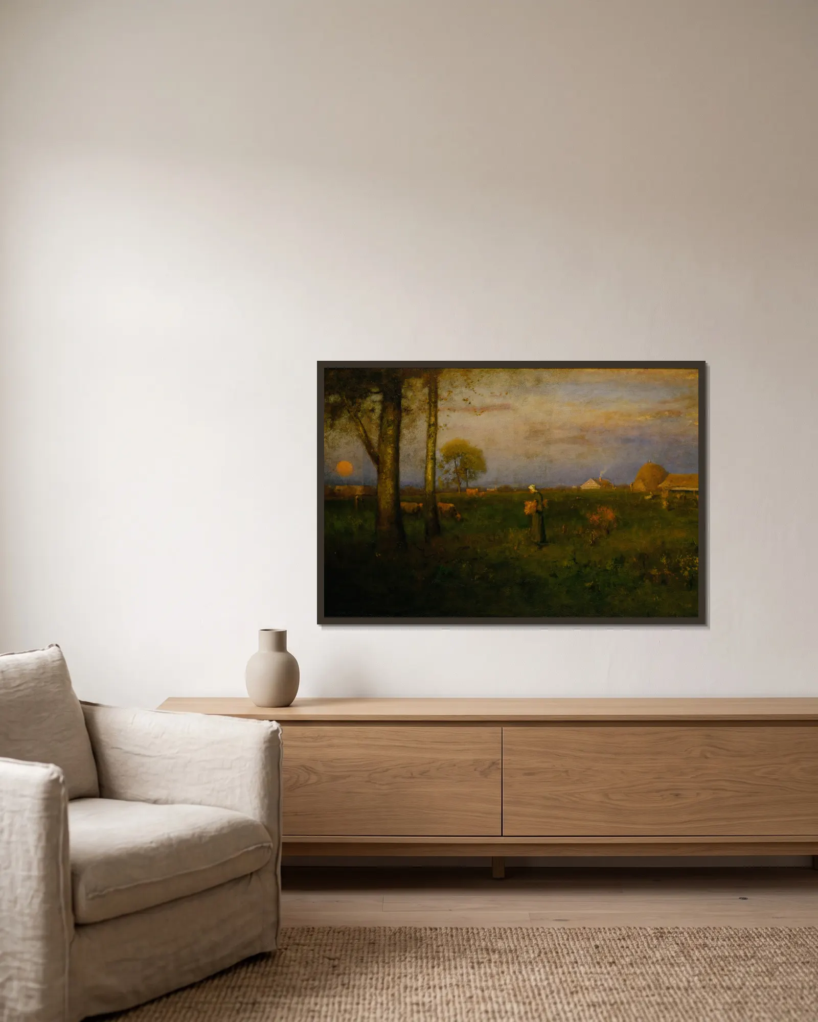 Sundown av George Inness inramad på en vägg