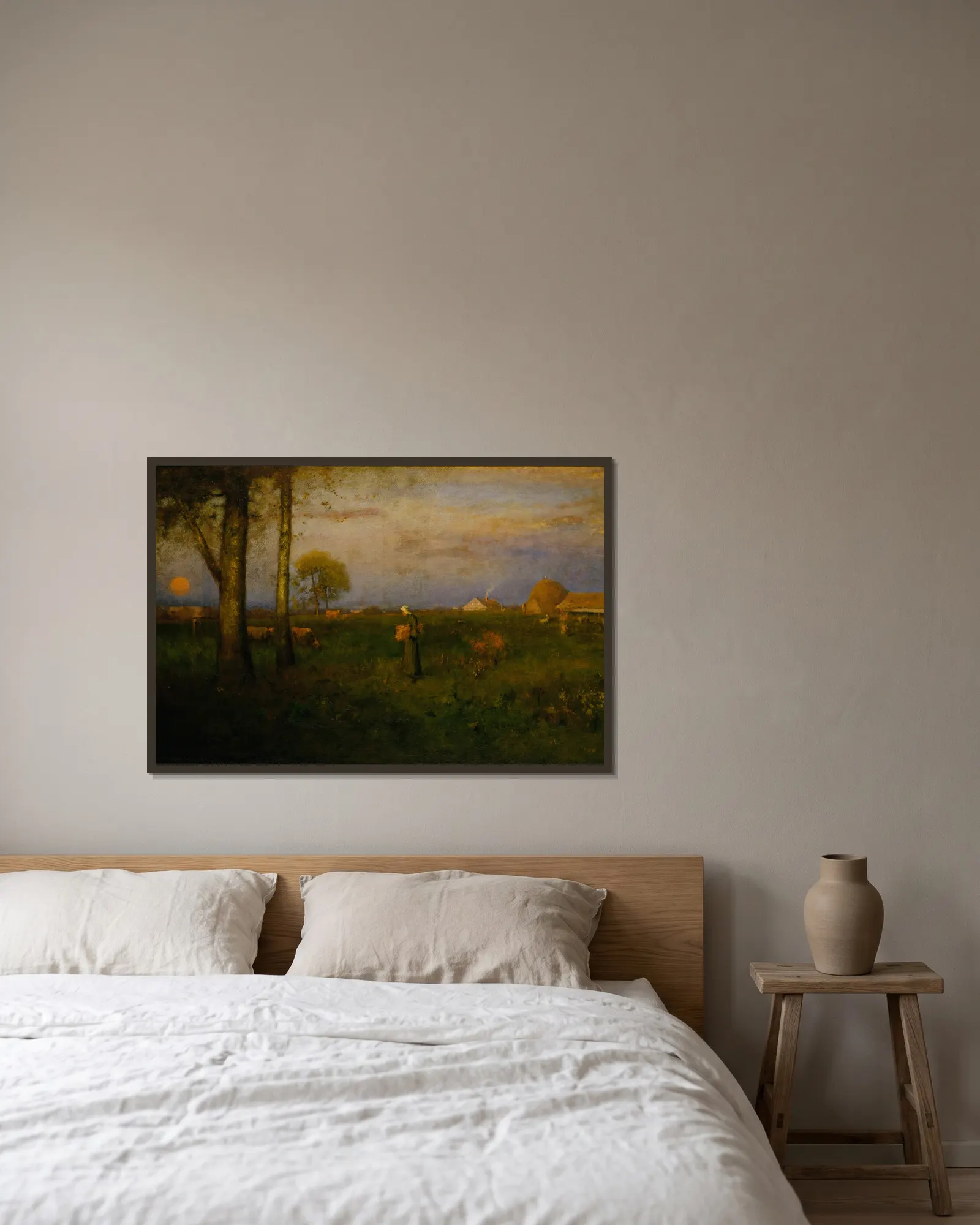 Sundown av George Inness inramad på en vägg
