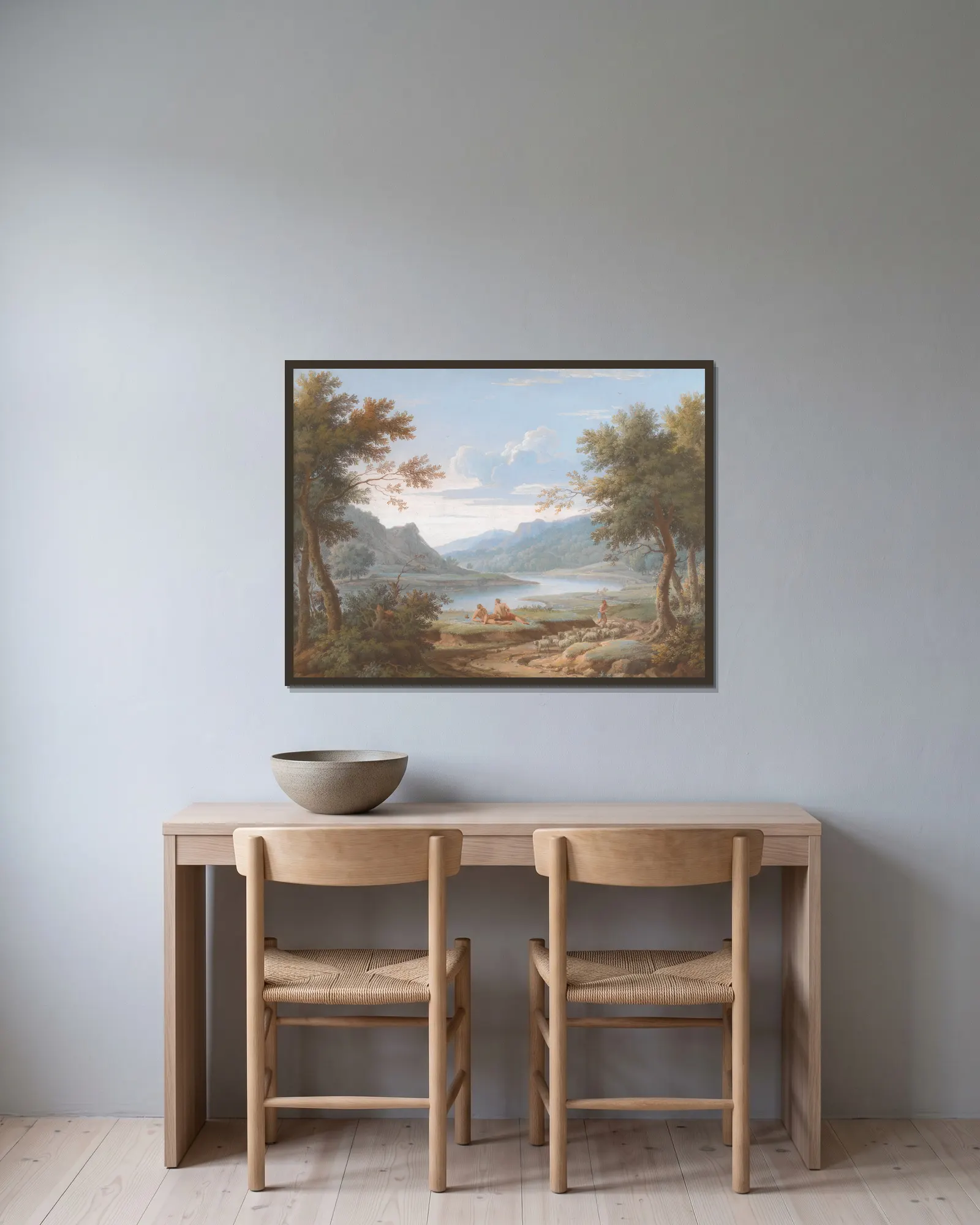 An Arcadian Landscape av George Lambert inramad på en vägg