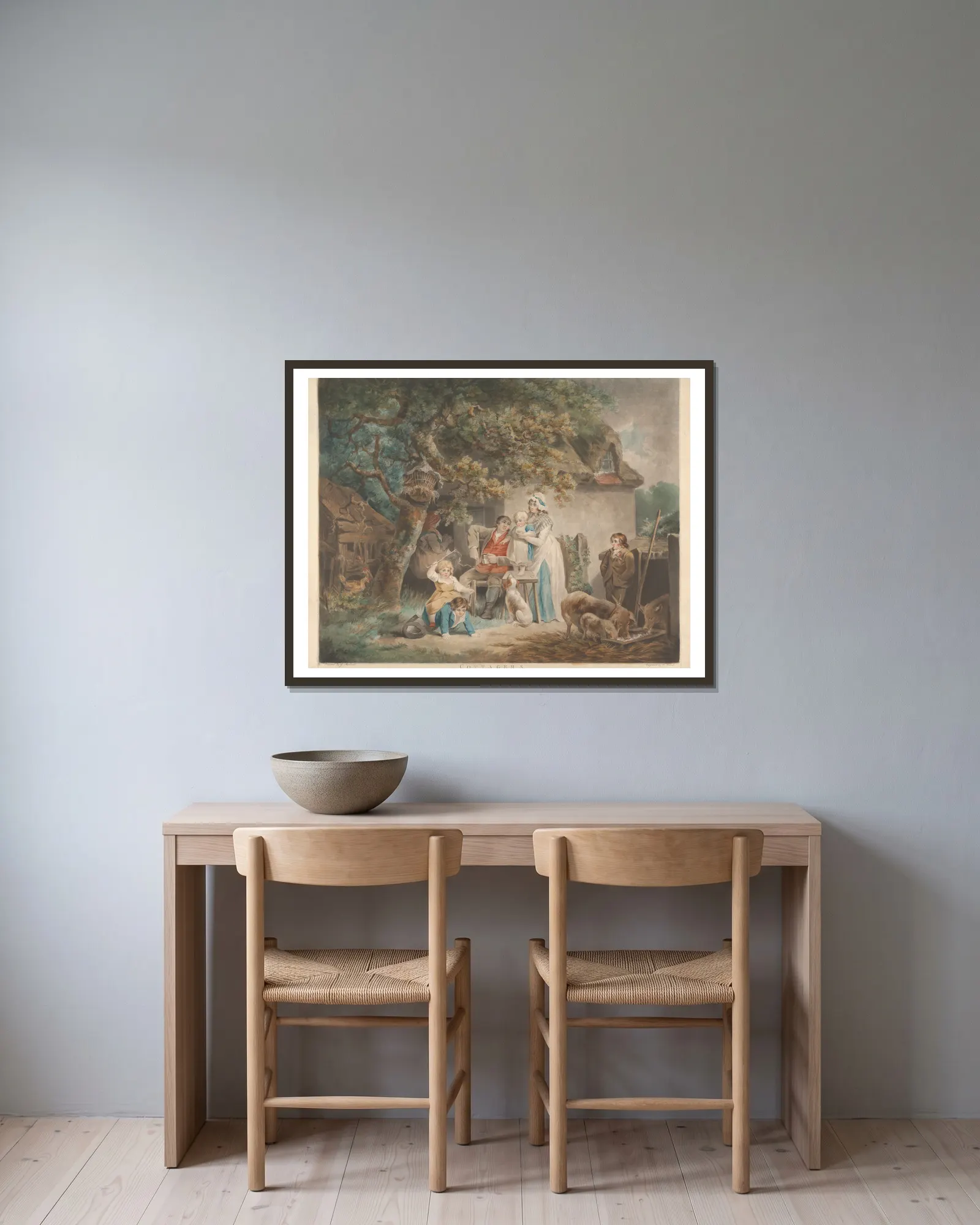 Cottagers av George Morland inramad på en vägg