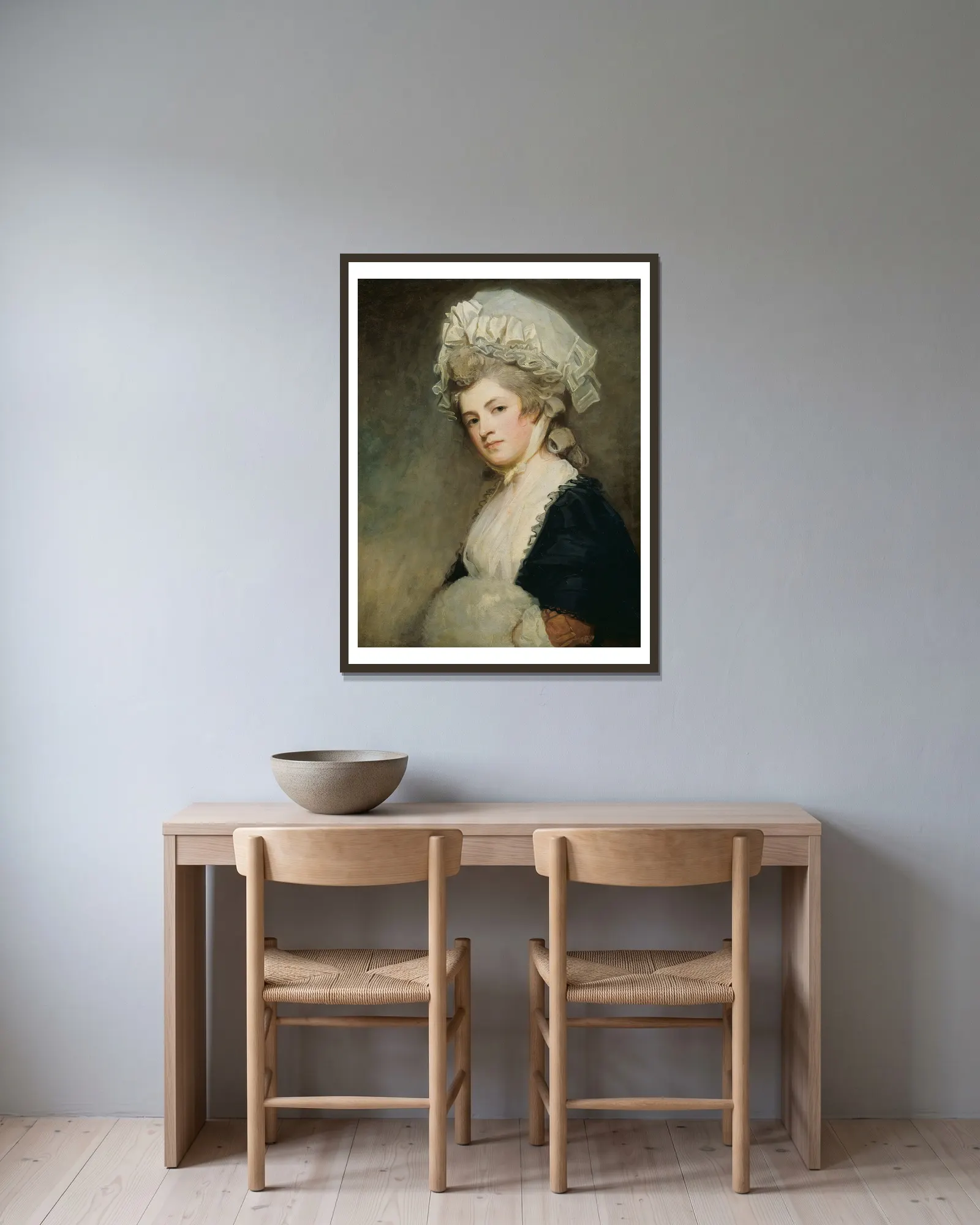 Mrs Mary Robinson av George Romney inramad på en vägg