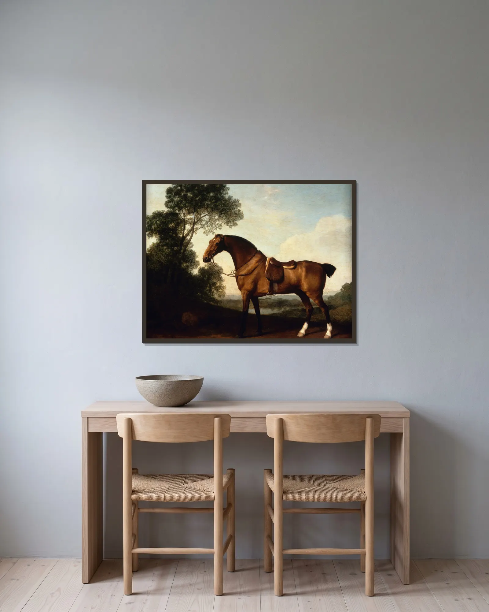 A Saddled Bay Hunter av George Stubbs inramad på en vägg