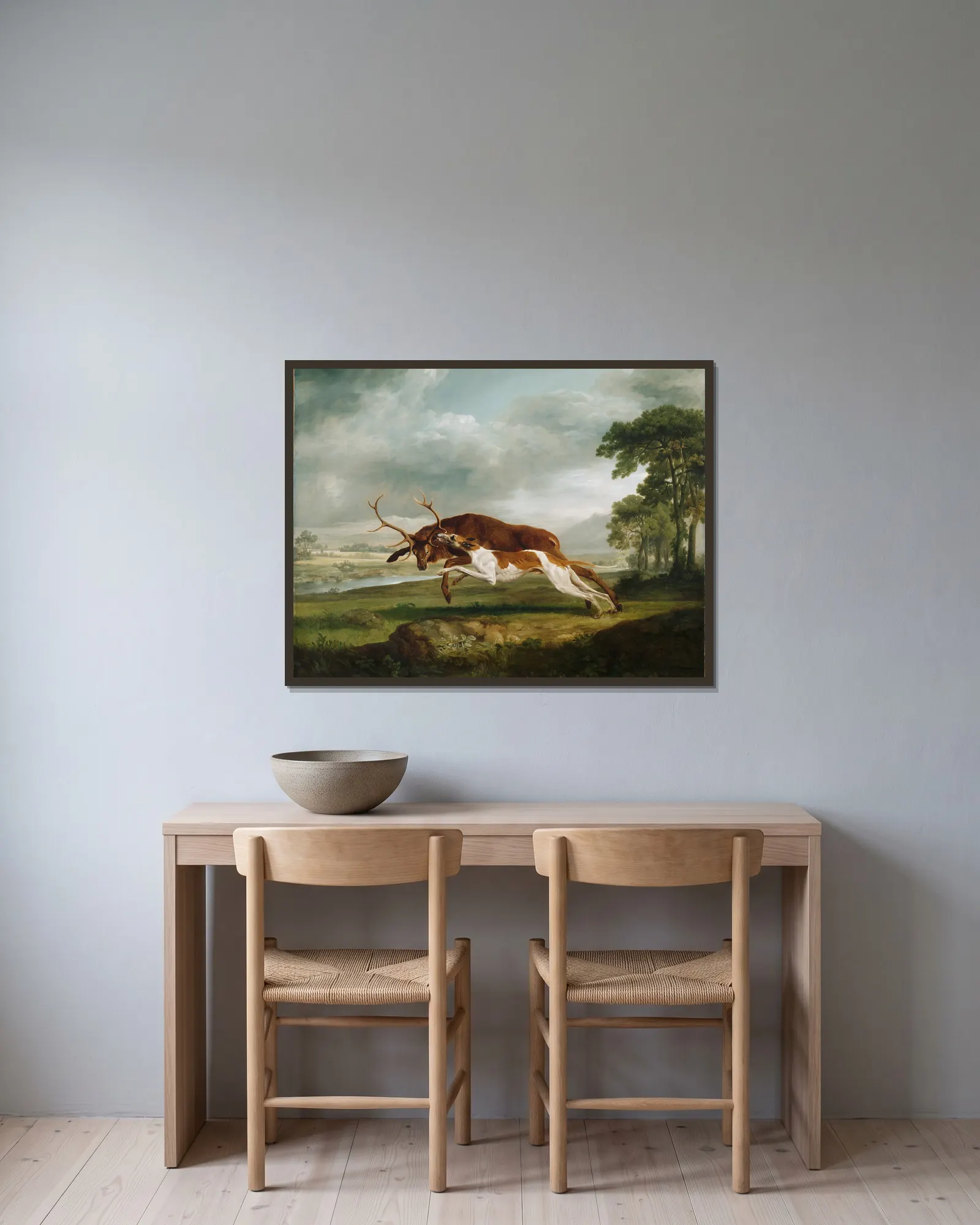 Hound Coursing a Stag av George Stubbs inramad på en vägg