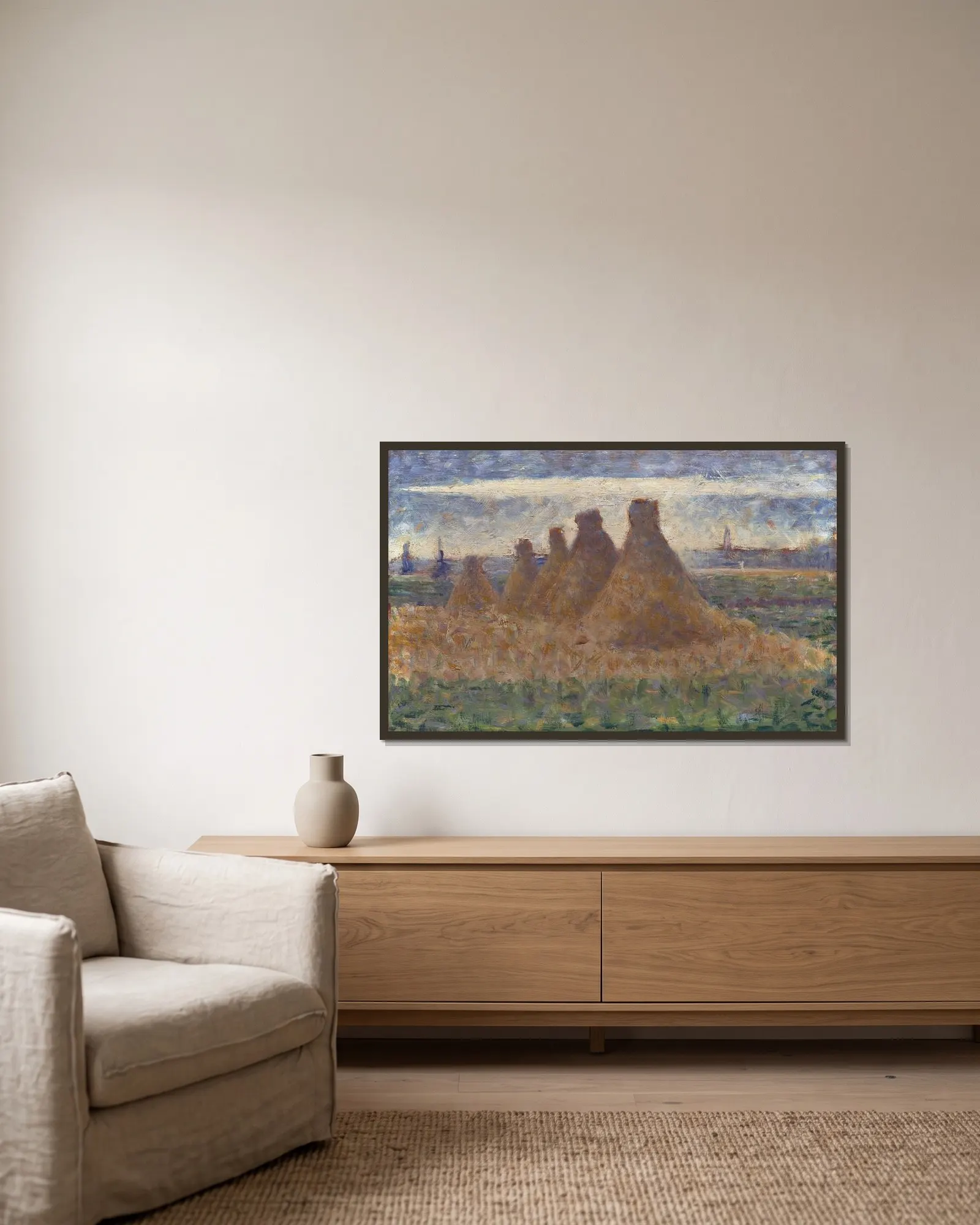 Haystacks av Georges Seurat inramad på en vägg