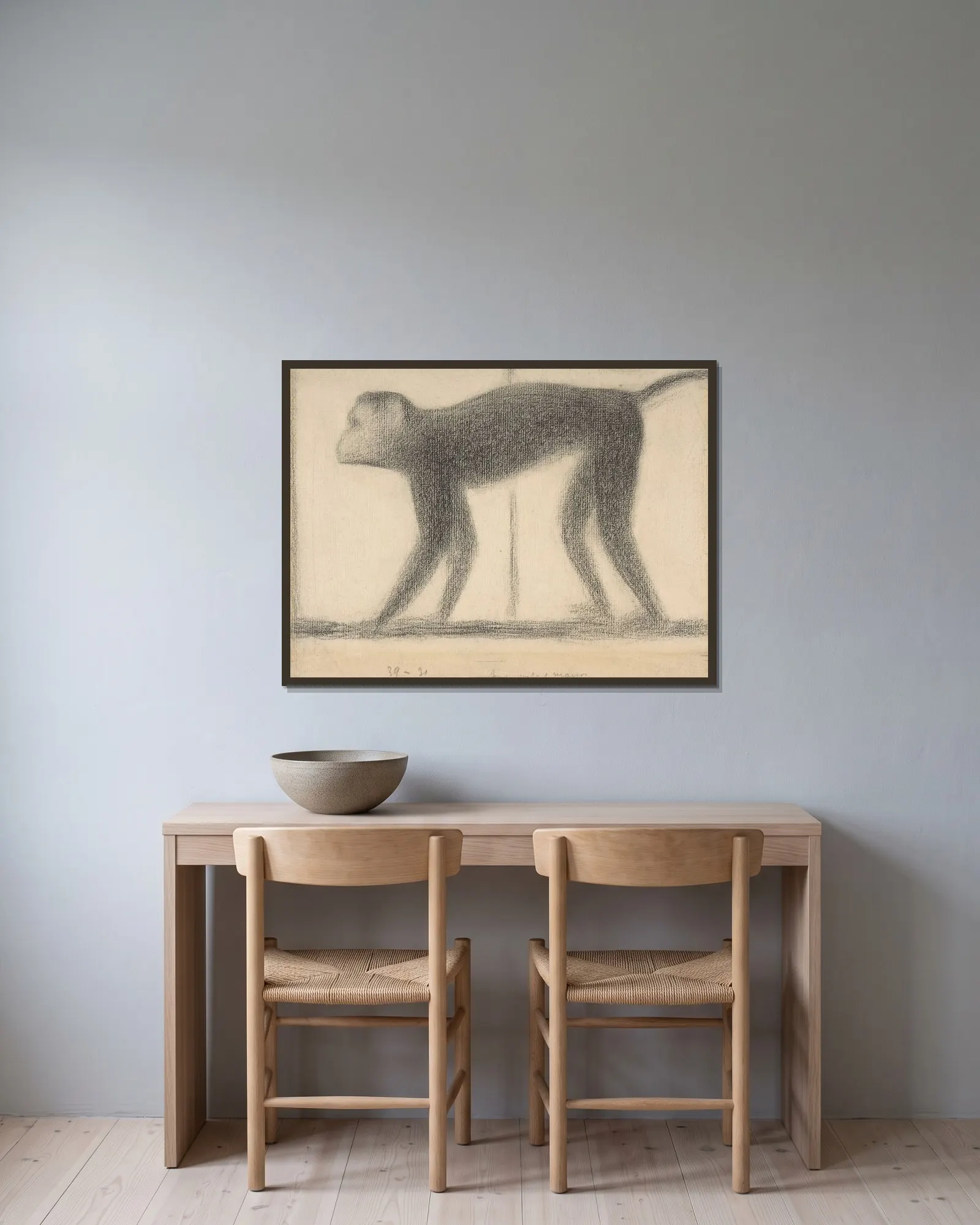 Monkey av Georges Seurat inramad på en vägg
