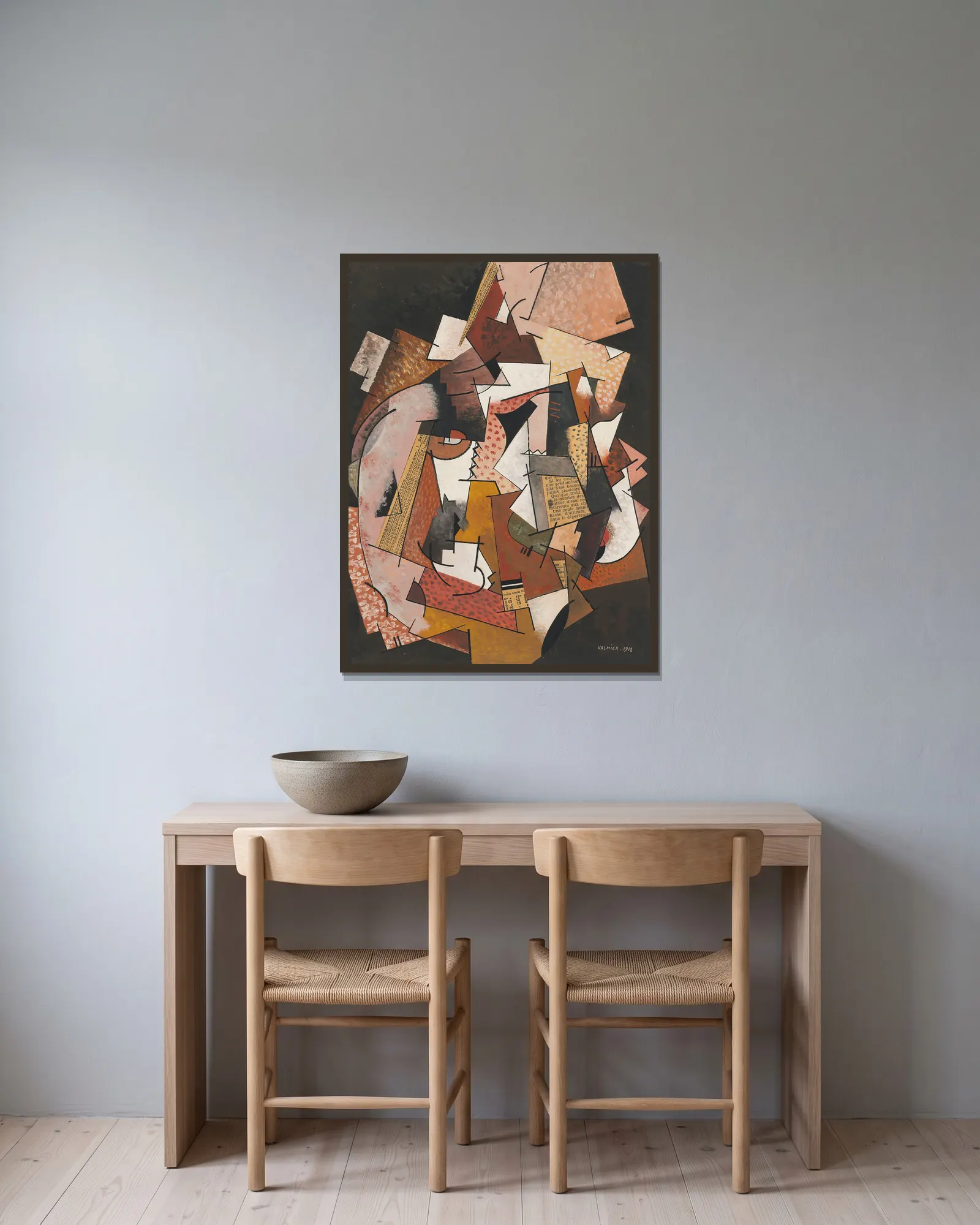 Composition au papier journal av Georges Valmier inramad på en vägg
