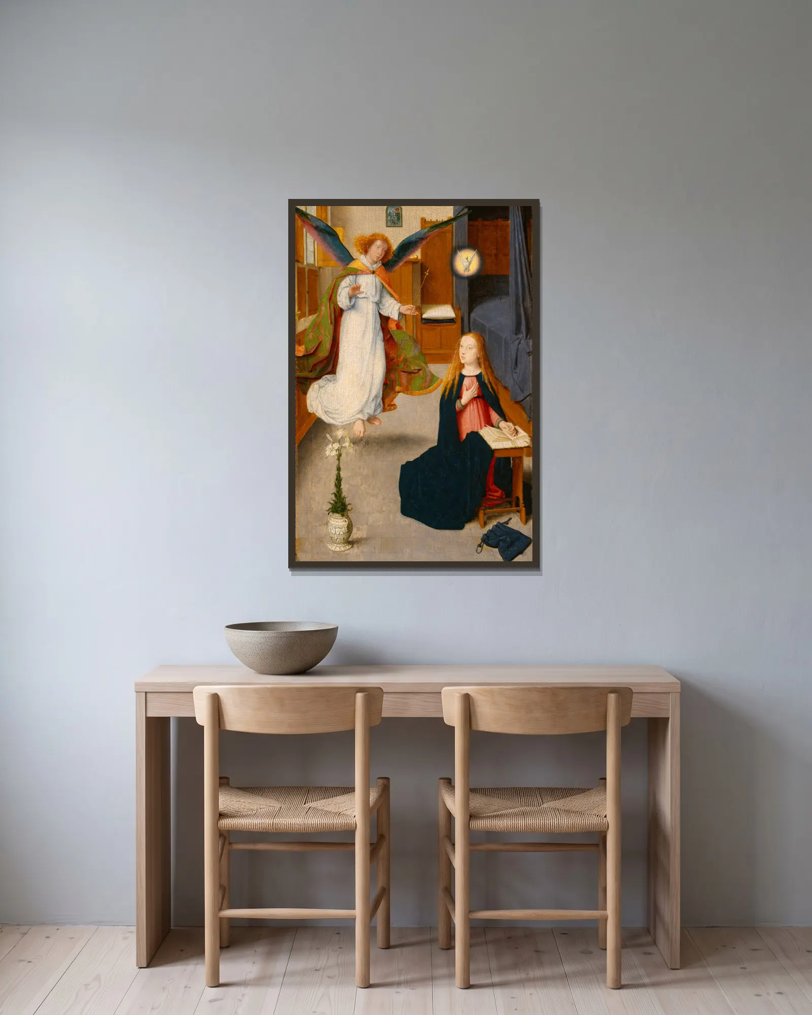 The Annunciation av Gerard David inramad på en vägg