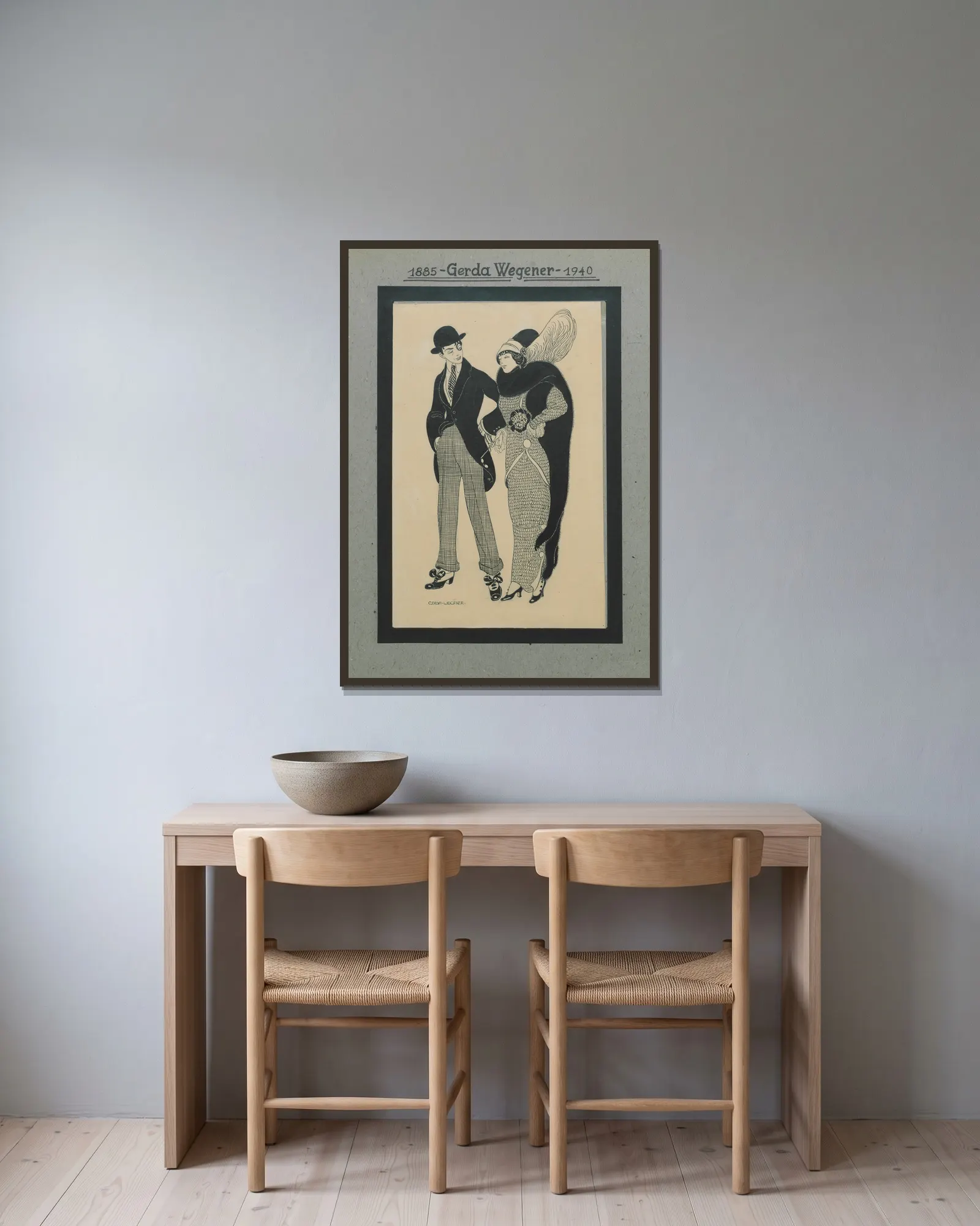 Man and Woman av Gerda Wegener inramad på en vägg