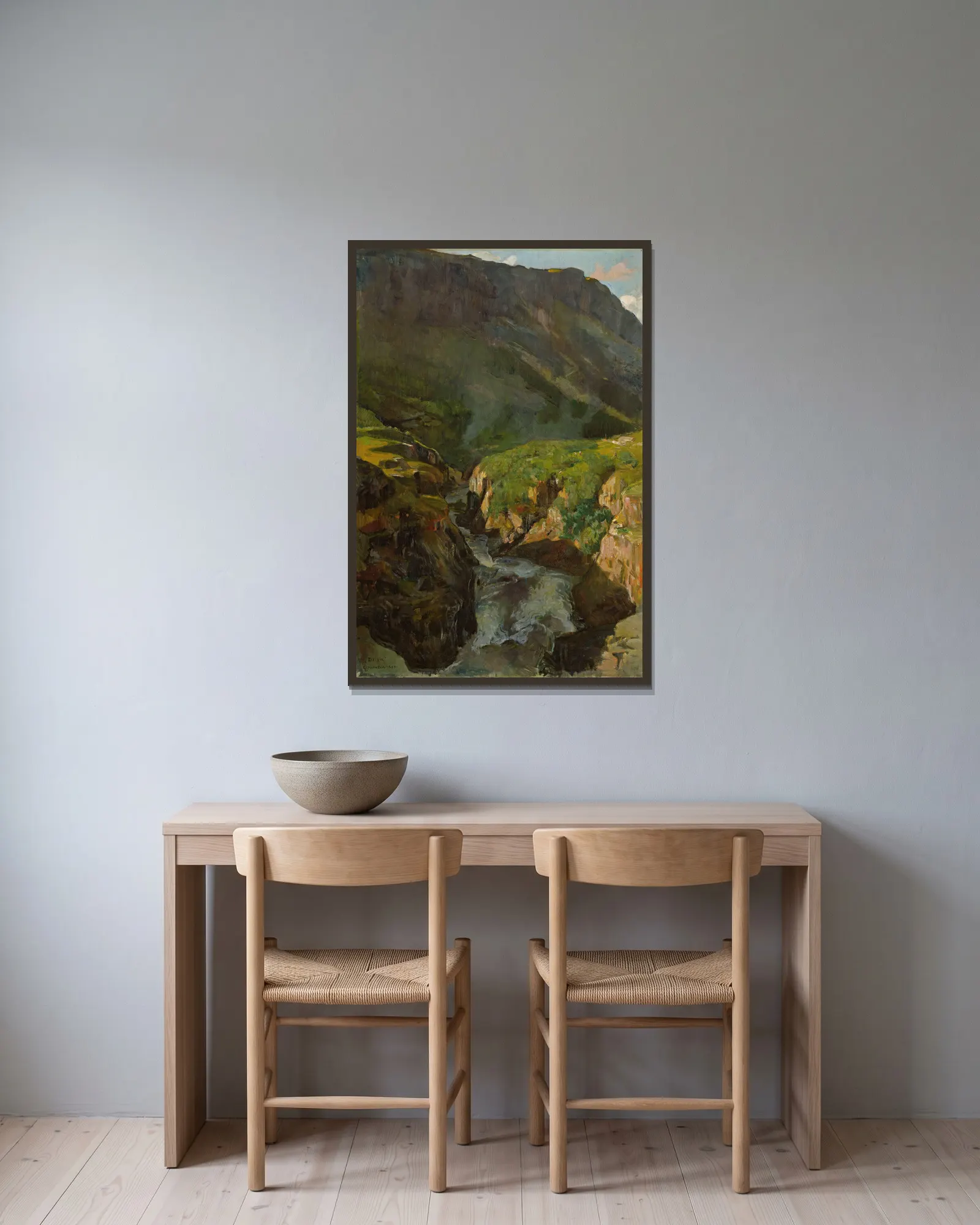 The River Driva av Gerhard Munthe inramad på en vägg