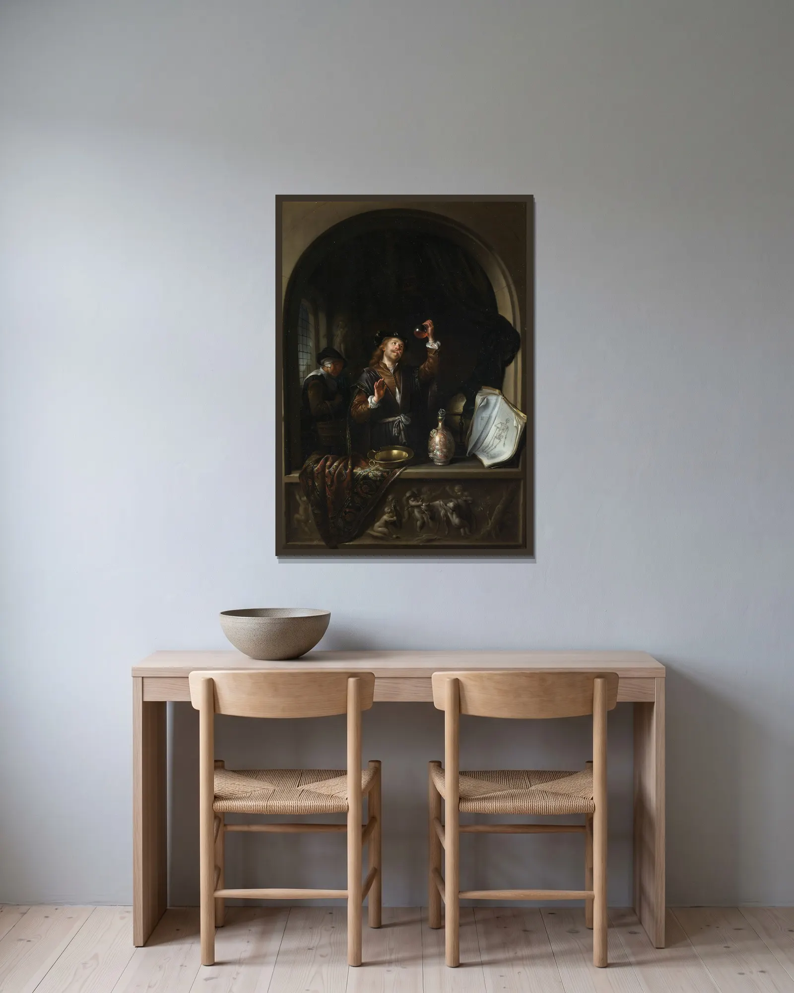 The Doctor av Gerrit Dou inramad på en vägg