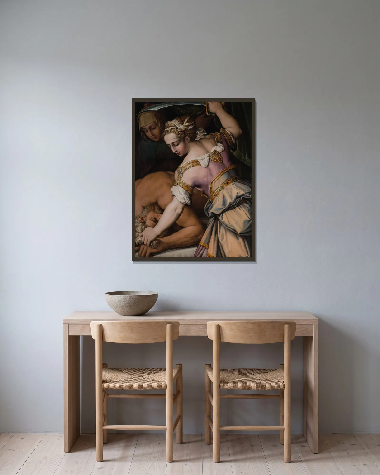 Judith and Holofernes av Giorgio Vasari inramad på en vägg